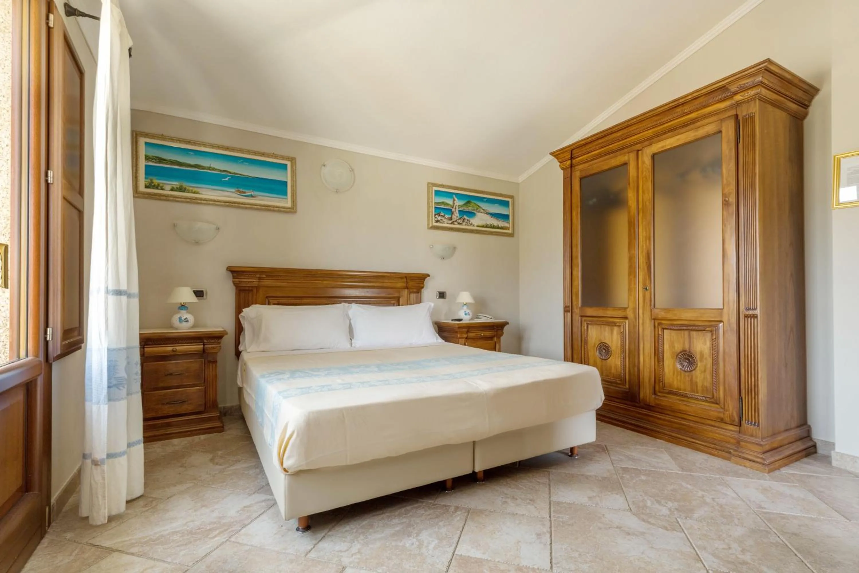 Bed in Hotel Sa Suergia