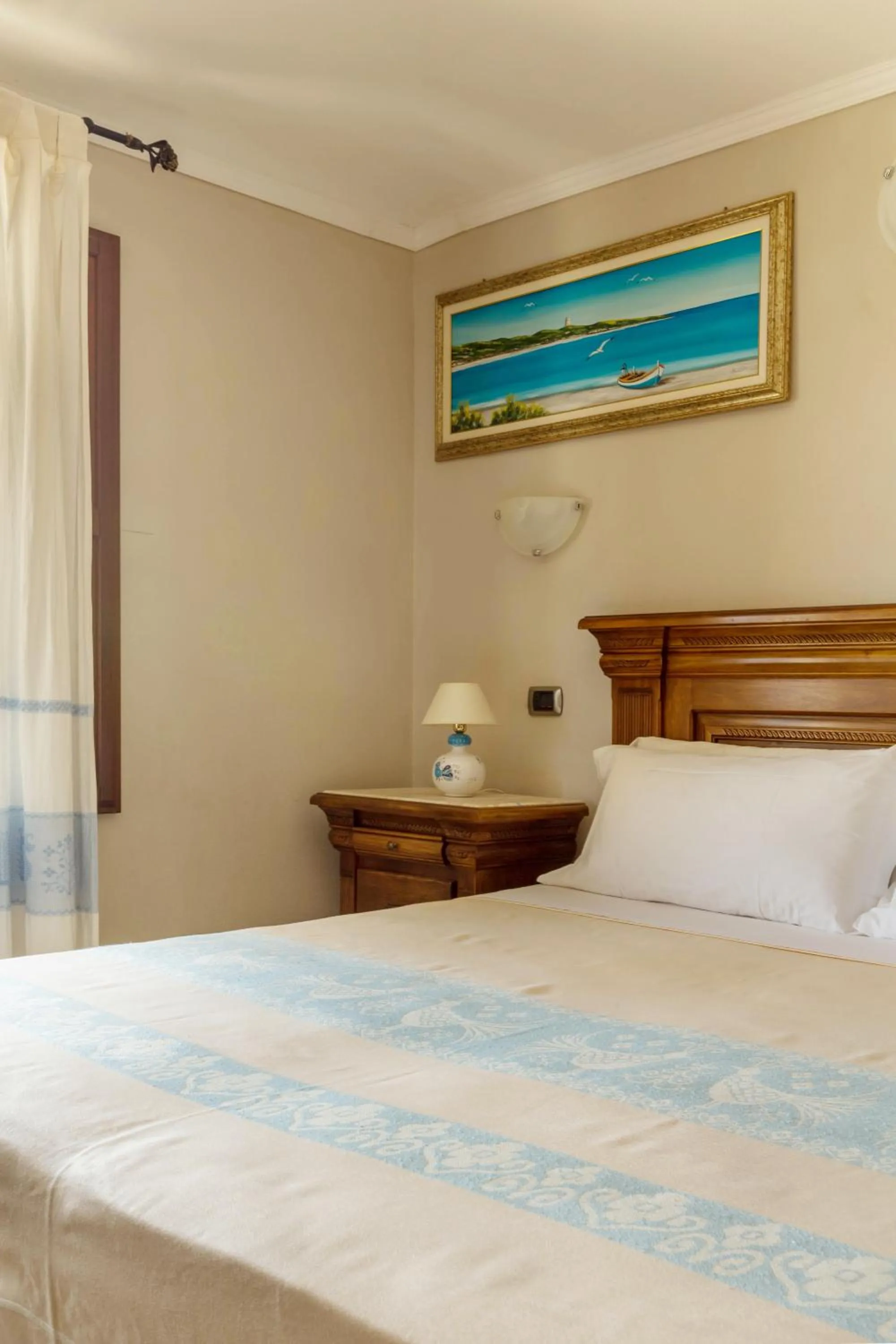 Bed in Hotel Sa Suergia