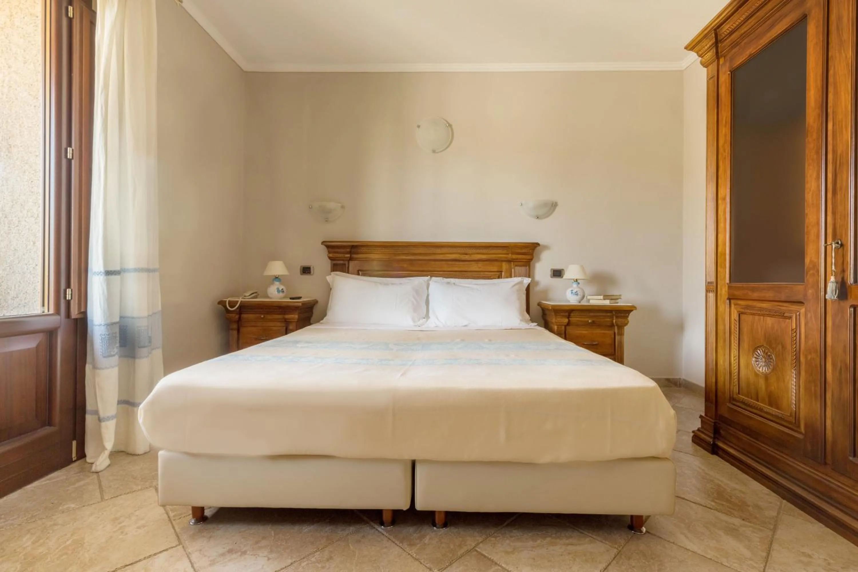 Bedroom in Hotel Sa Suergia