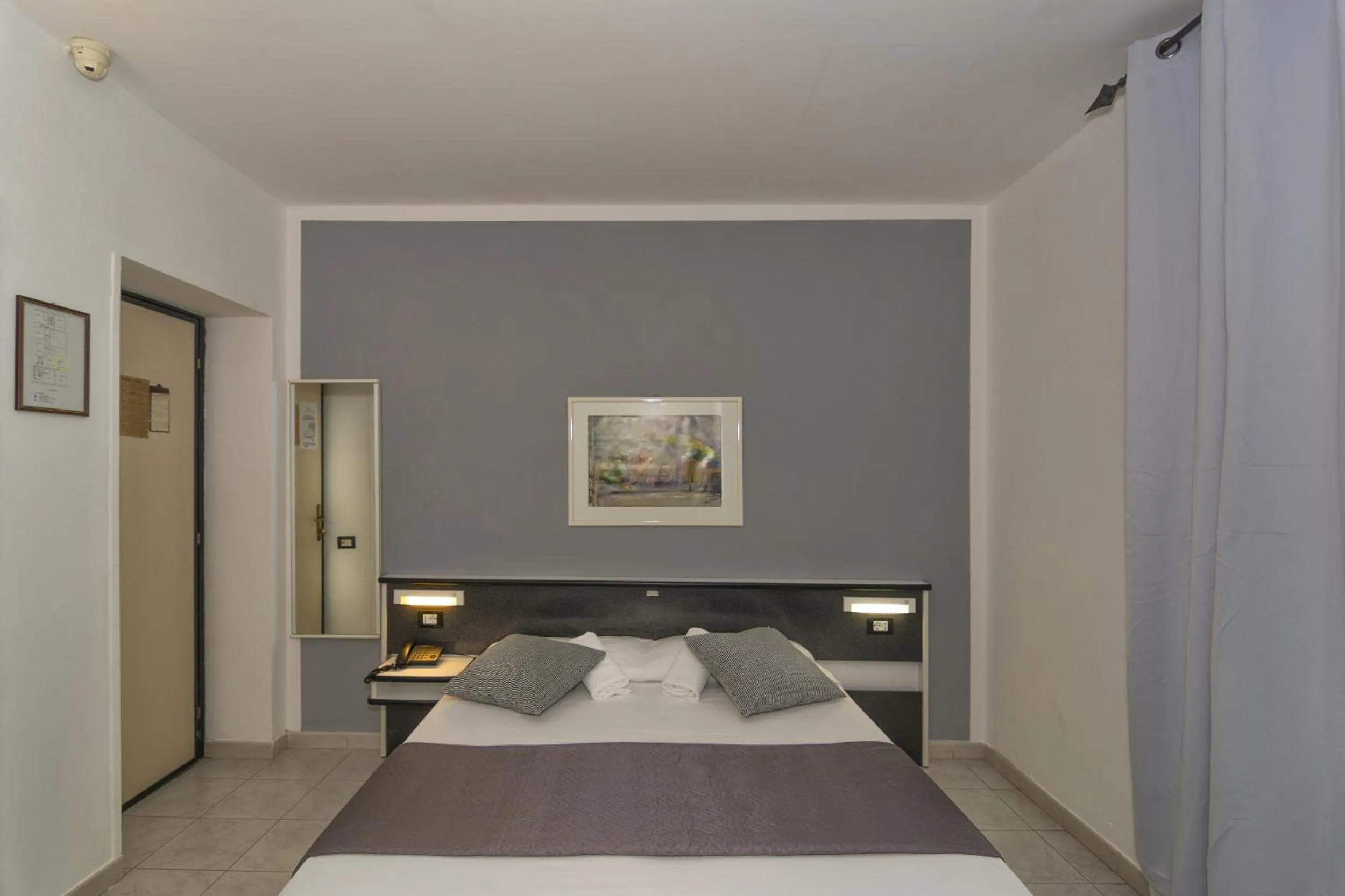 Bed in Hotel Amalfitana