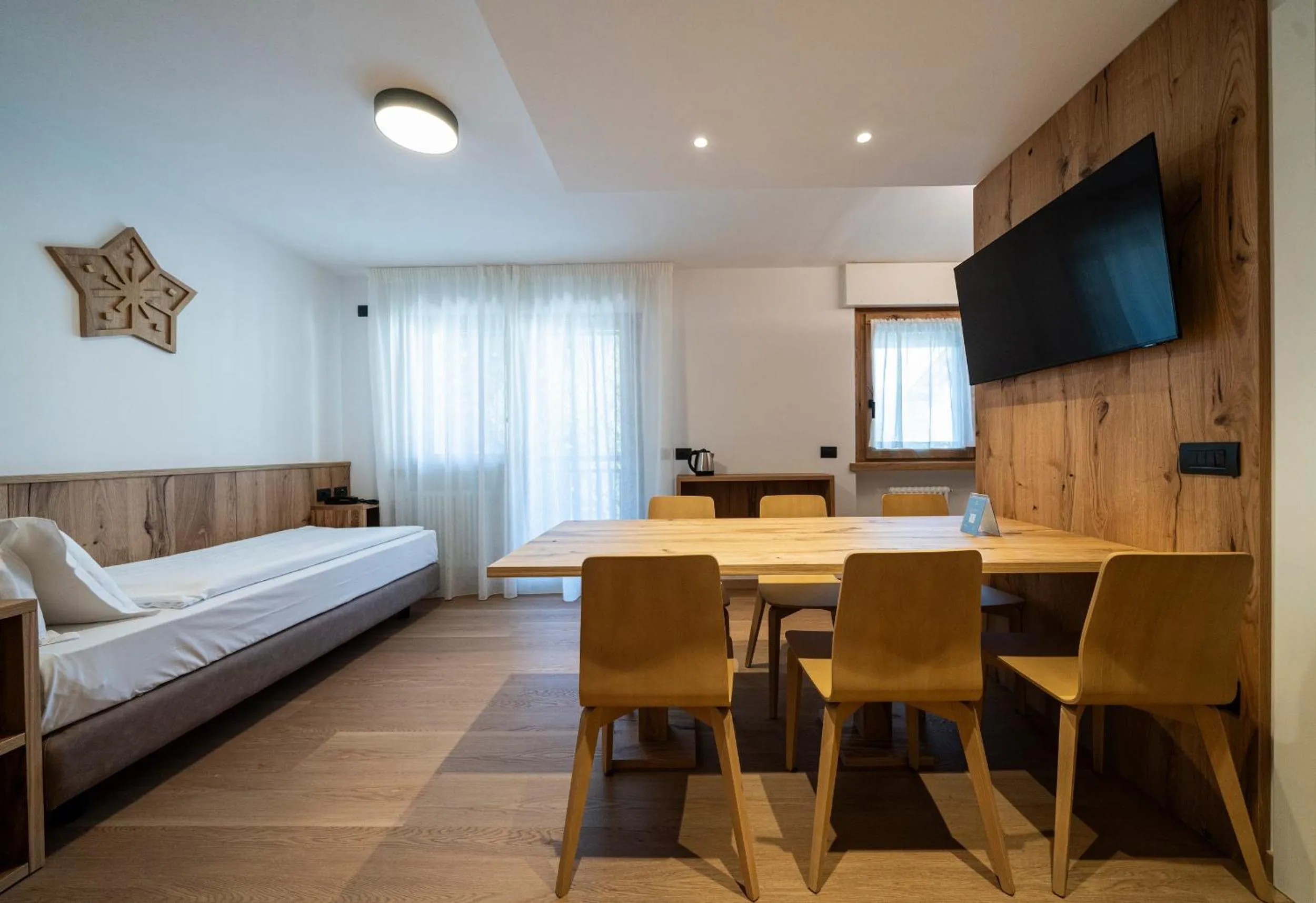 Living room, Bed in Residence Contrin