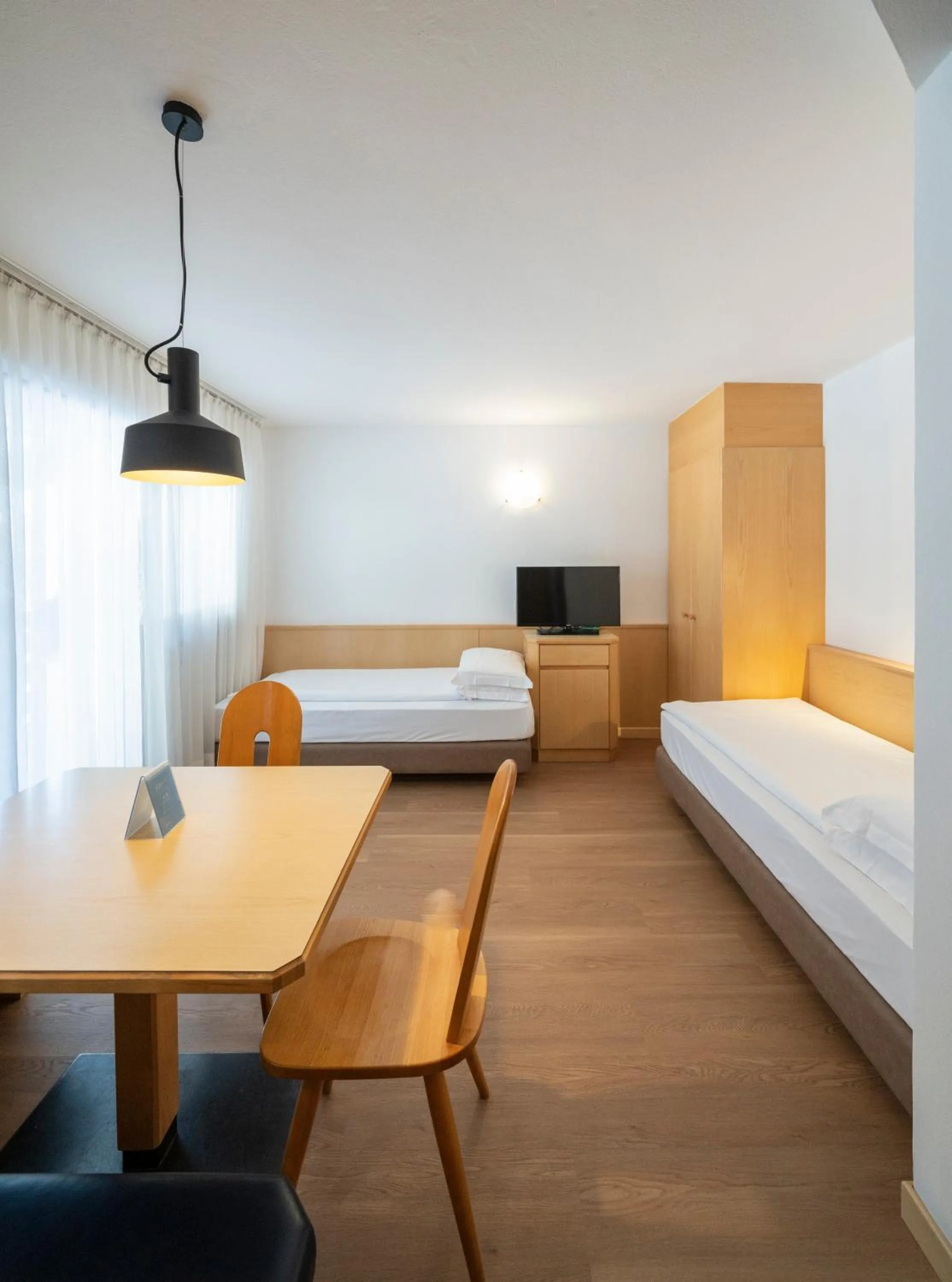 Living room, Bed in Residence Contrin