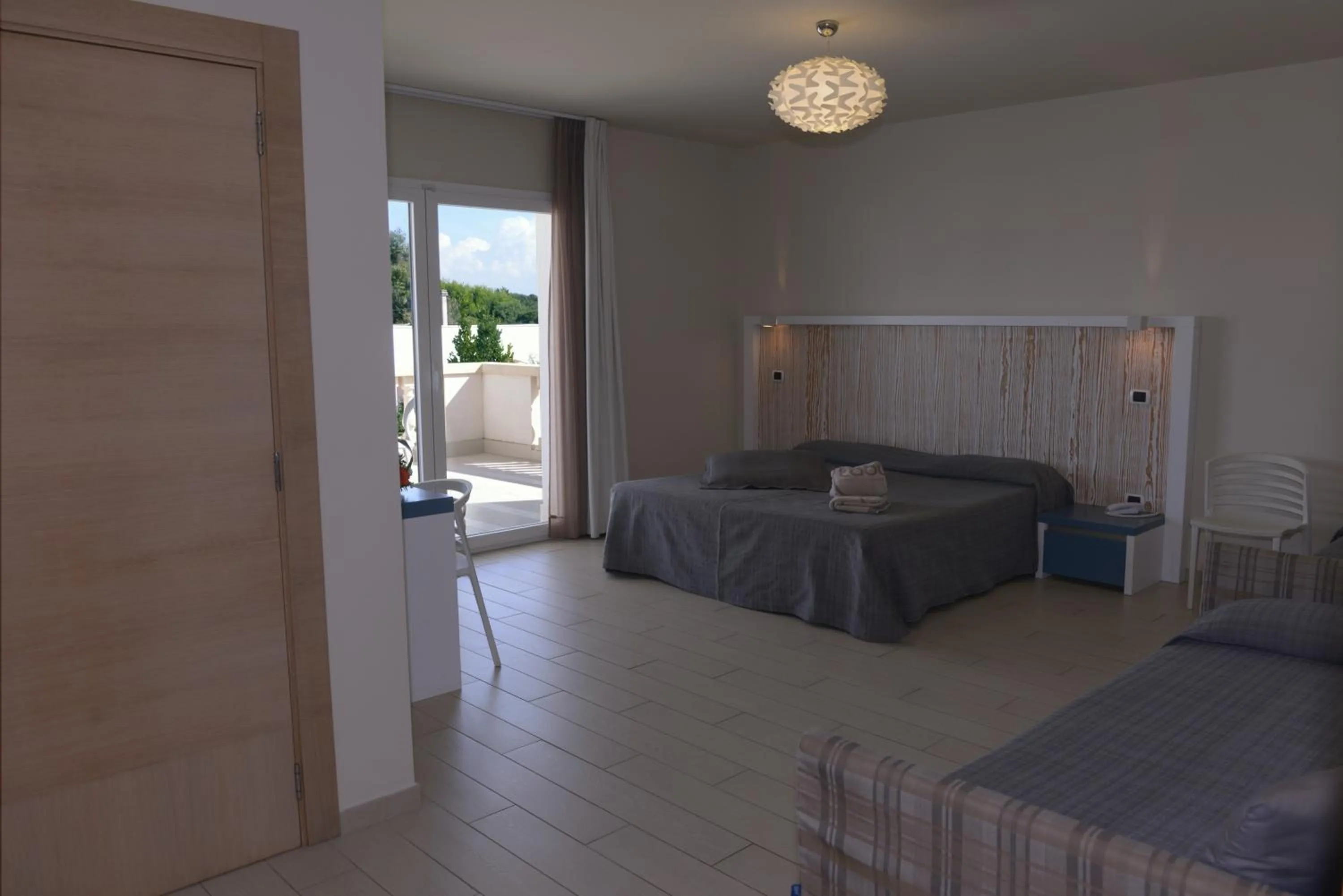 Bedroom in Tabù Hotel