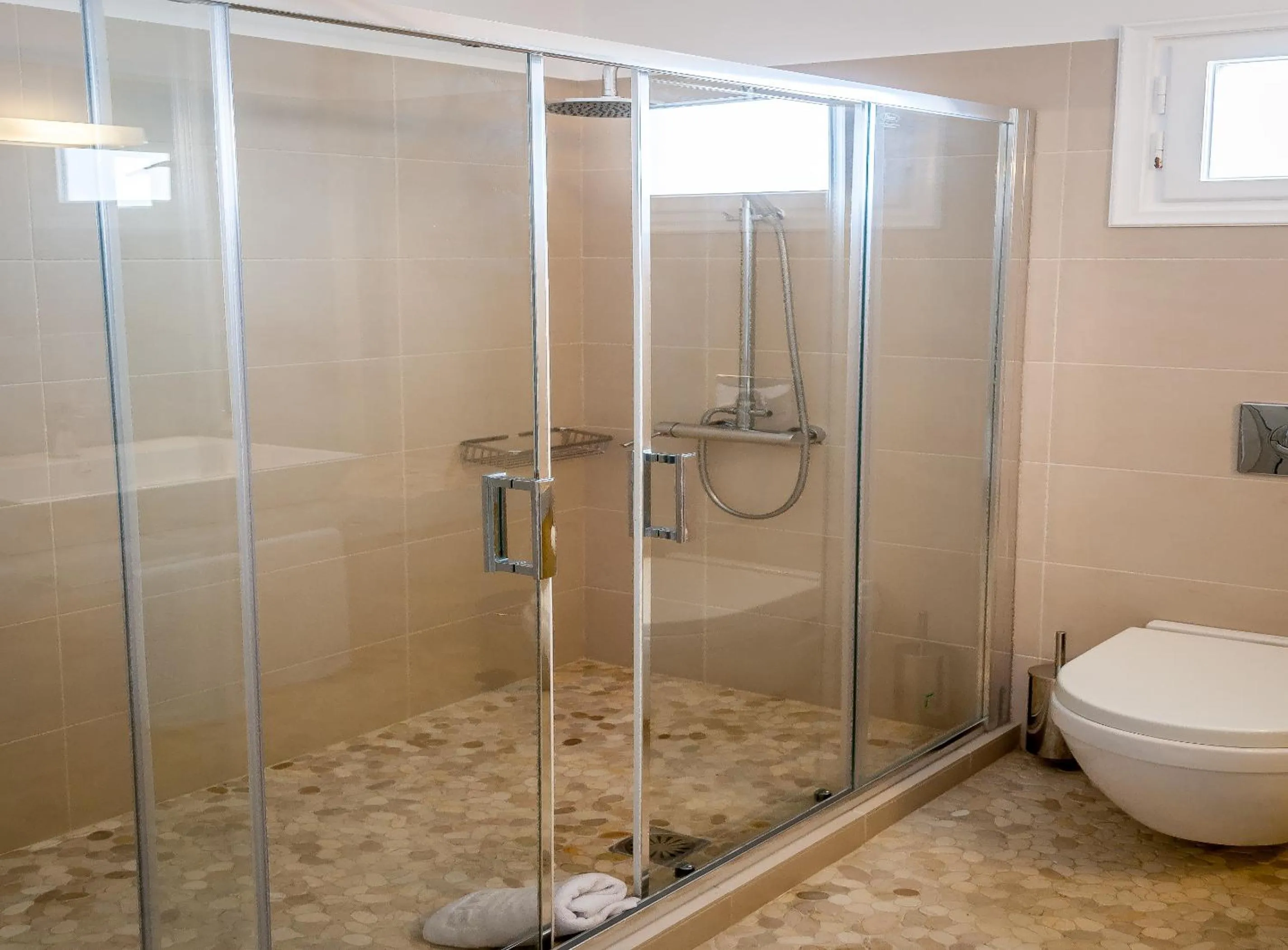 Bathroom in Milos Bay Suites