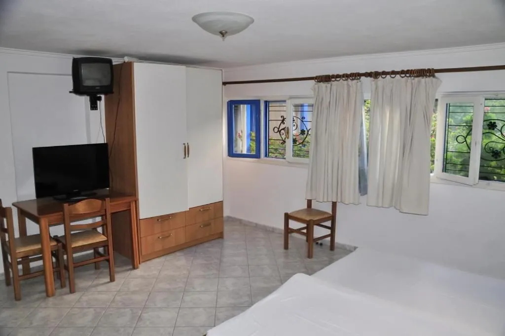 Seating area, Bed in Milos Bay Suites