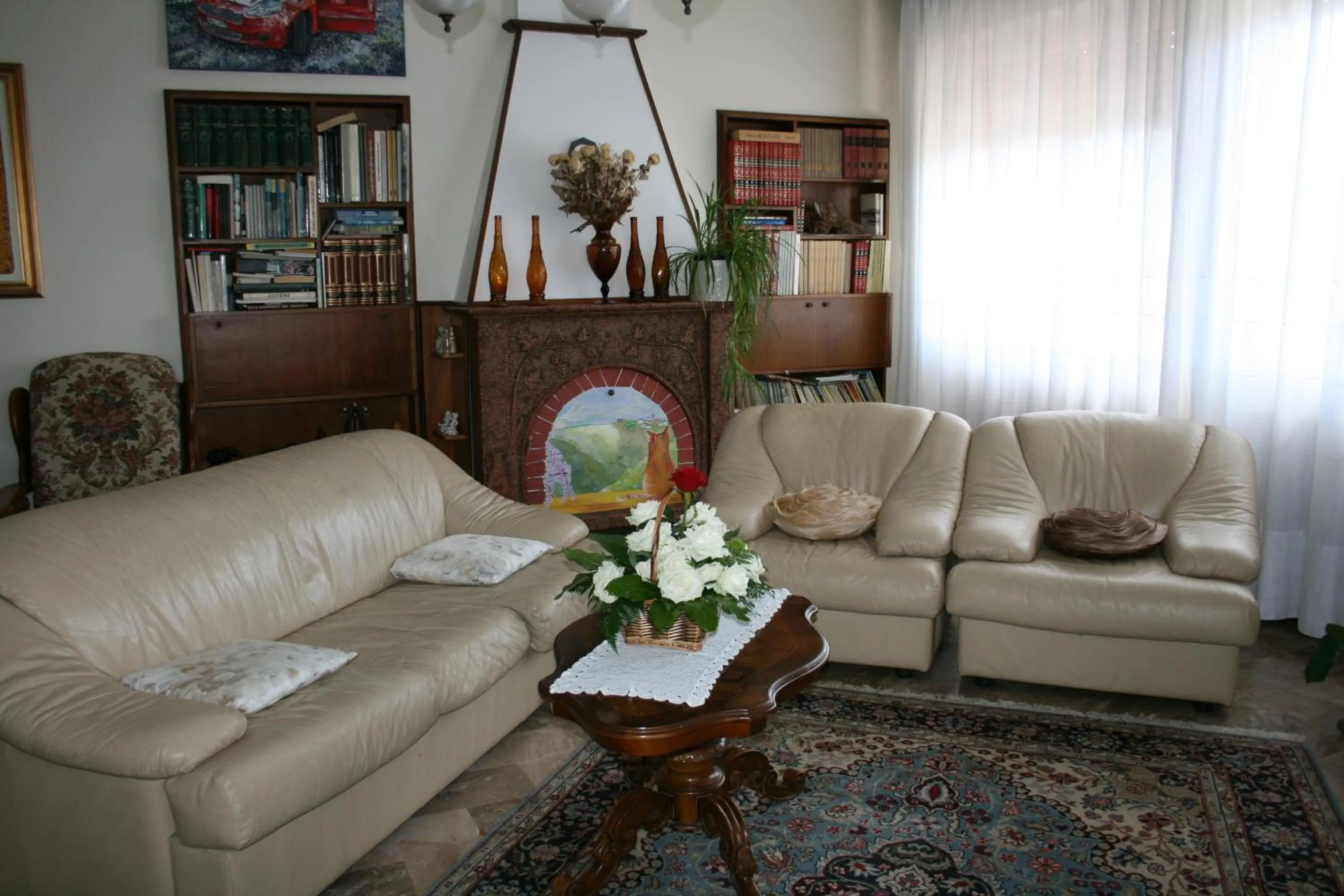 Communal lounge/ TV room in B&B Il Glicine