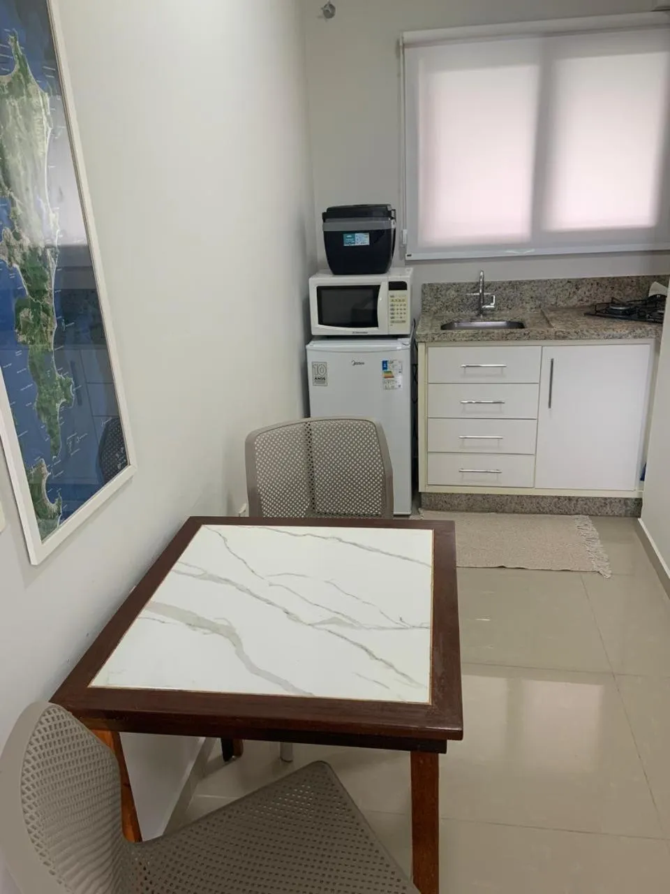 Kitchen or kitchenette in Pousada Mar de Cristal