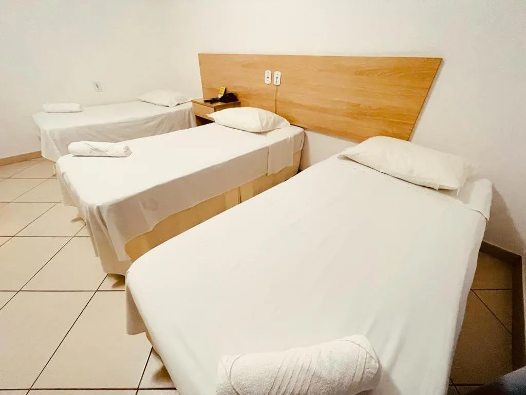 Bed in Pioneiro Hotel
