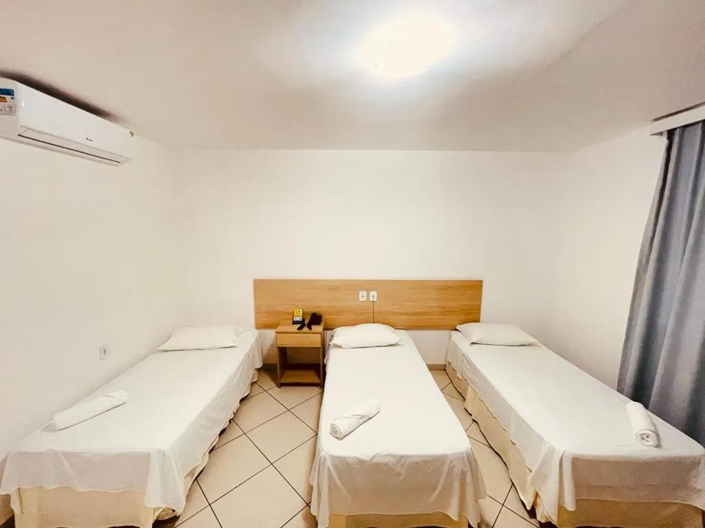 Bed in Pioneiro Hotel