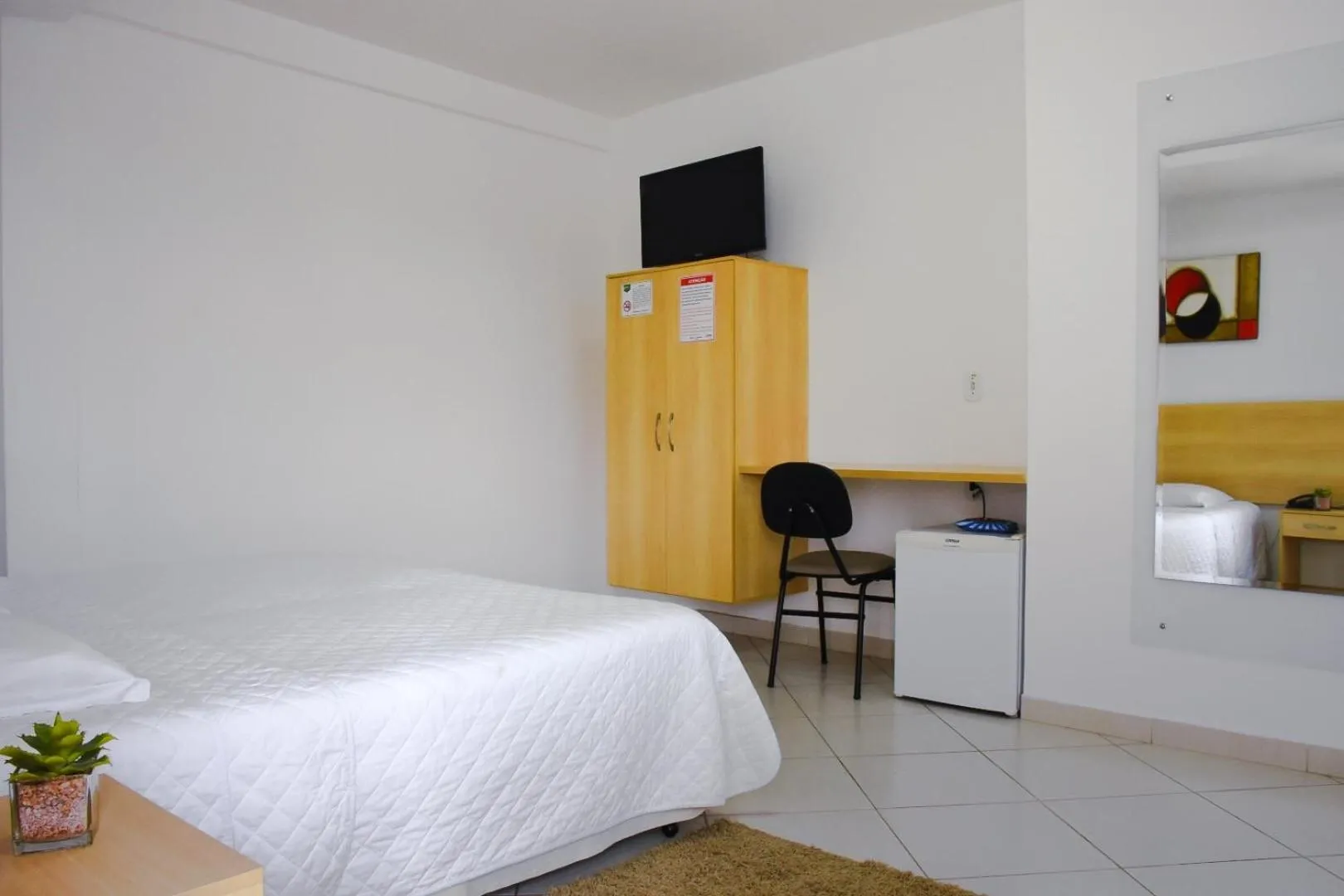 TV and multimedia, Bed in Pioneiro Hotel