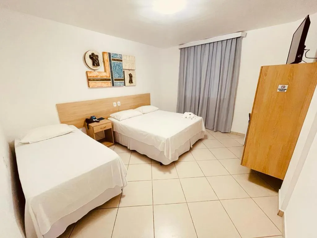 Bed in Pioneiro Hotel