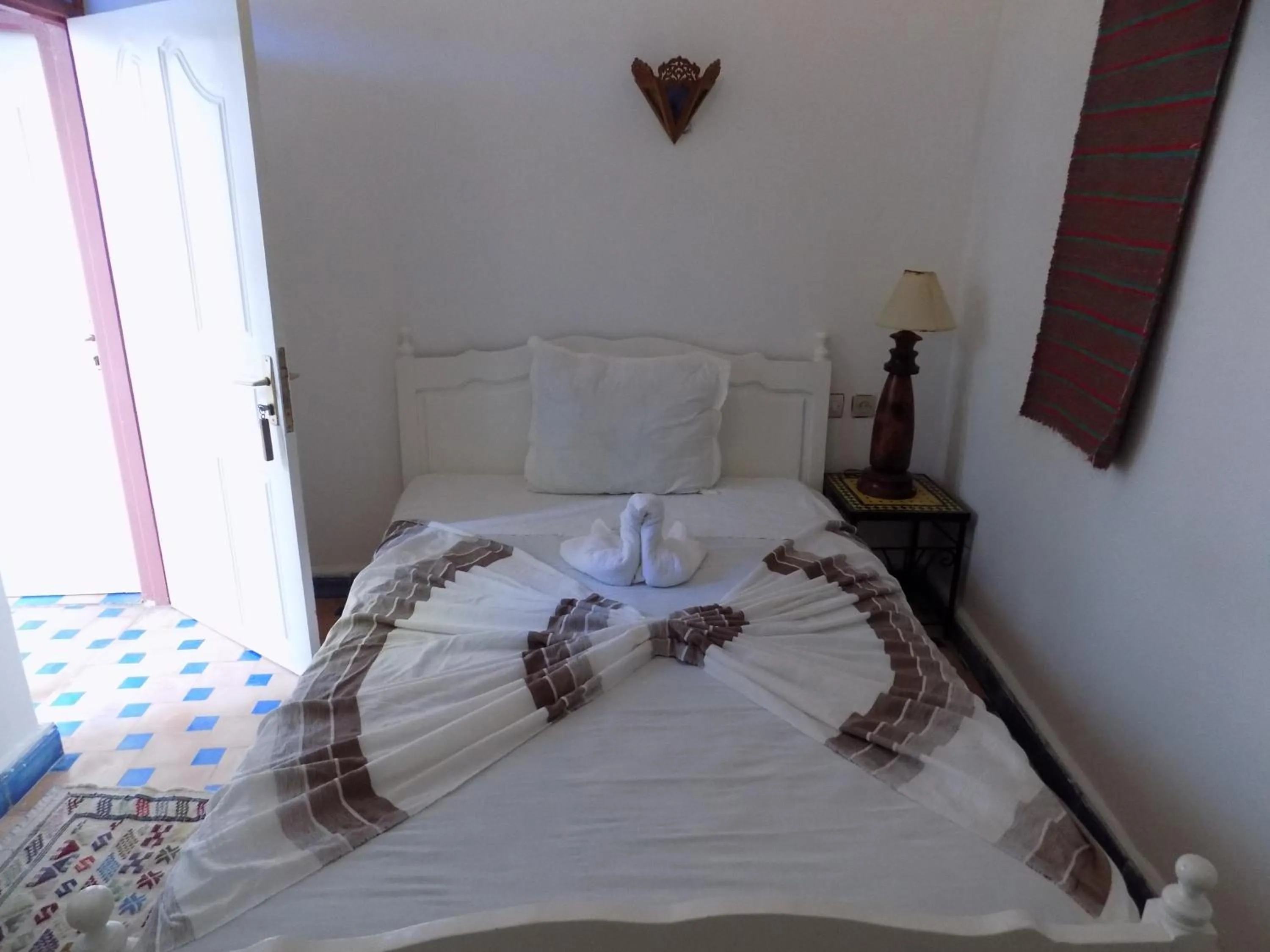 Bed in Hôtel Riad Gnaoua