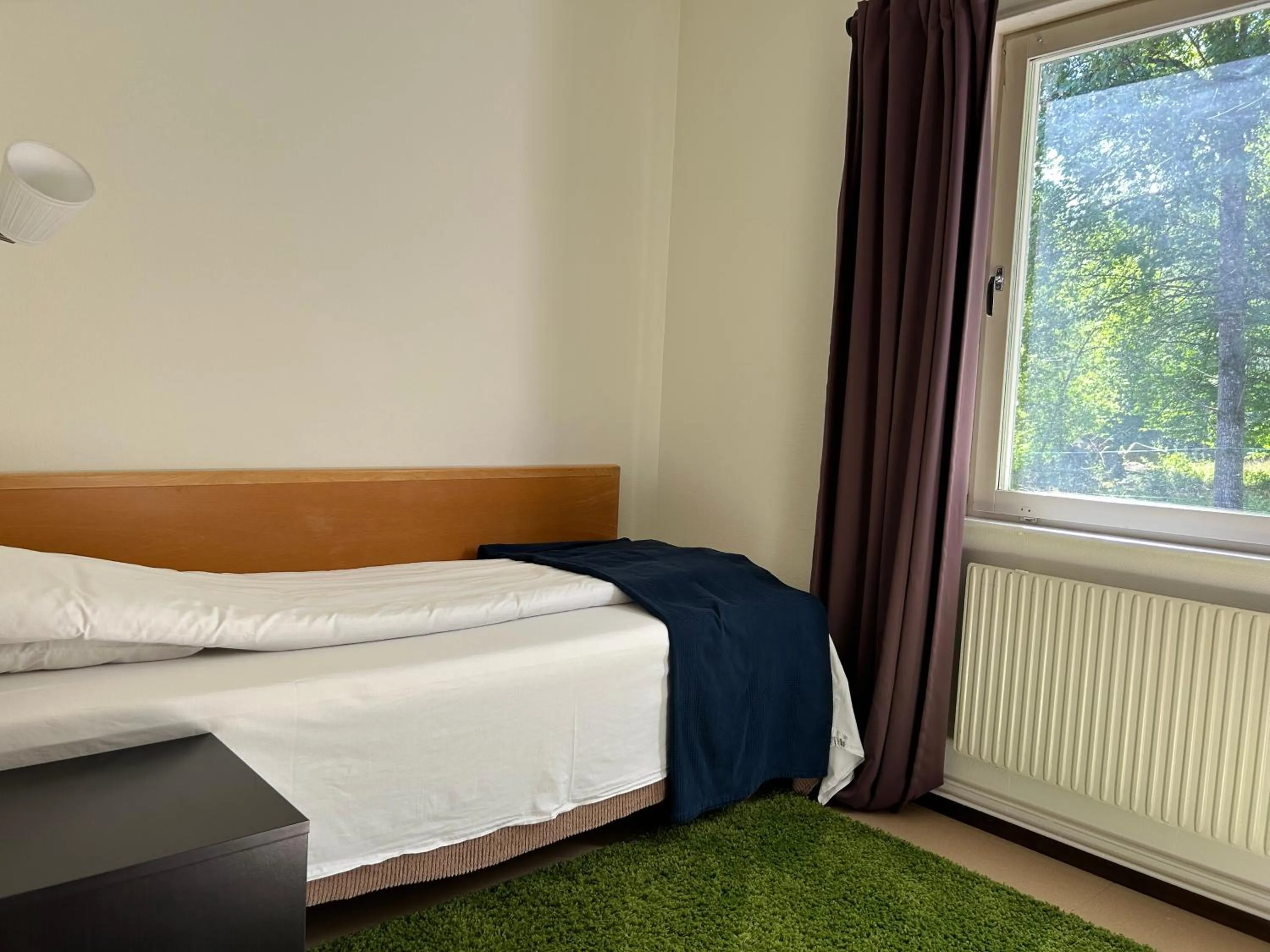 Photo of the whole room, Bed in Klackbergsgården