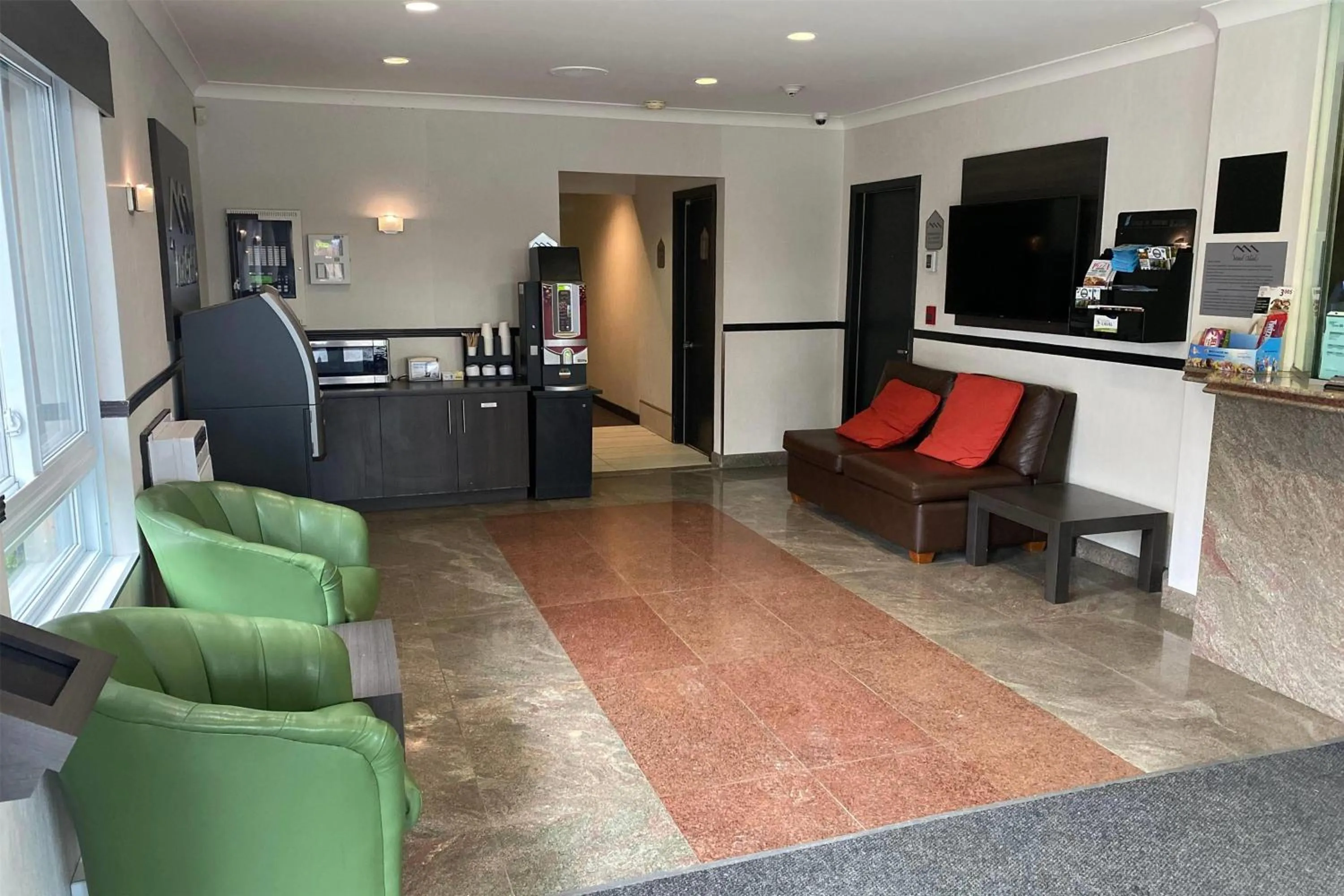 Lobby or reception in Ramada by Wyndham Laval