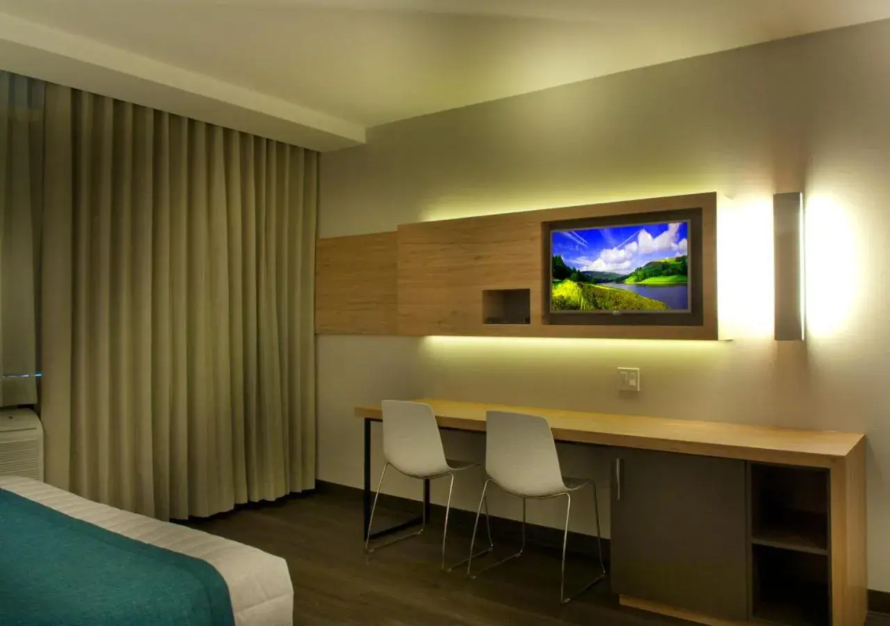 Superior Quadruple Room in Ramada by Wyndham Laval Superior Quadruple Room in Ramada by Wyndham Laval