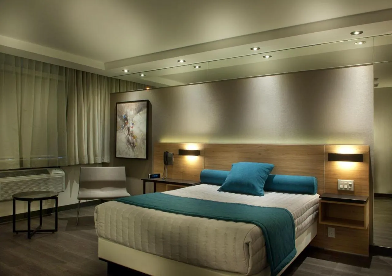 Bed in Ramada by Wyndham Laval