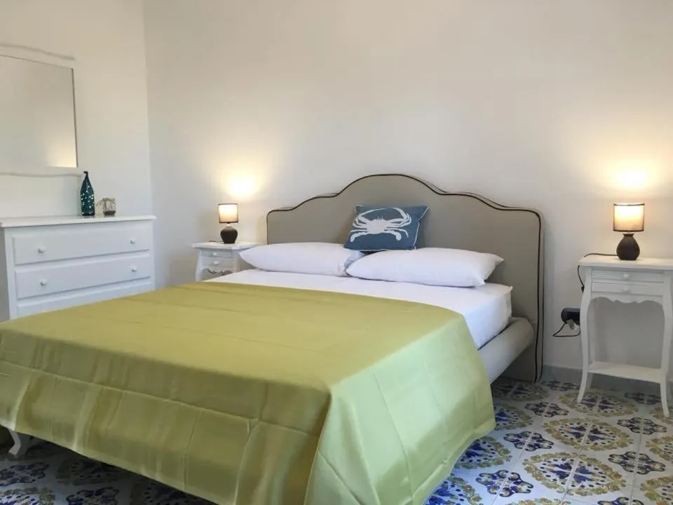 Bed in B&B Mediterraneo