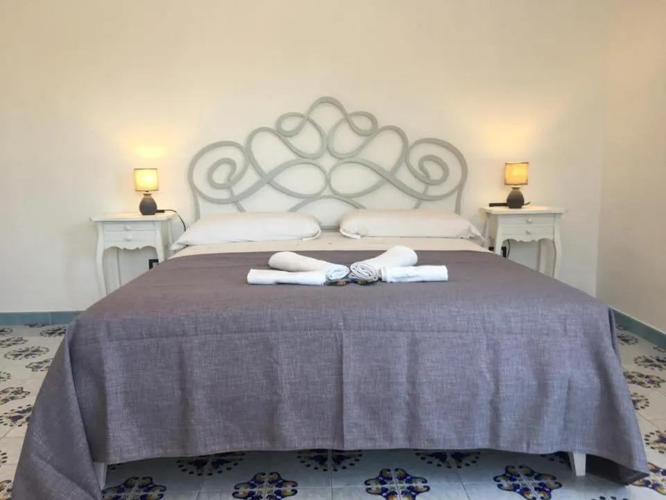 Bed in B&B Mediterraneo
