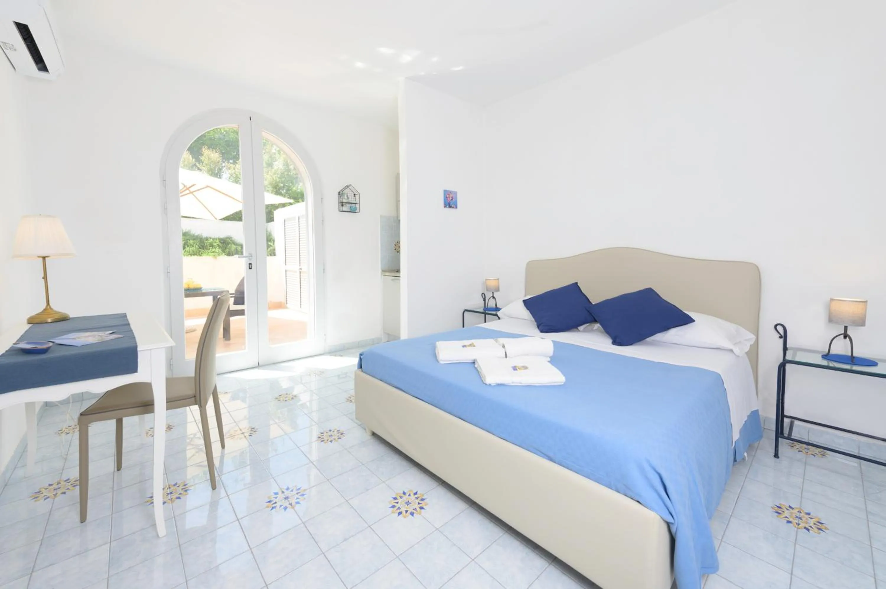 Bed in B&B Mediterraneo