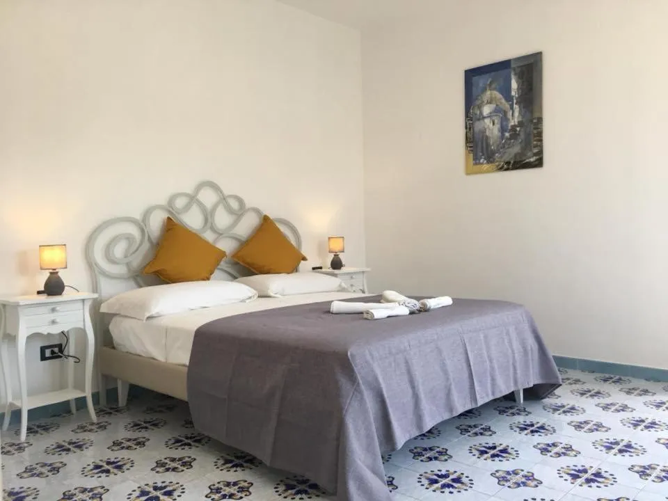 Bed in B&B Mediterraneo