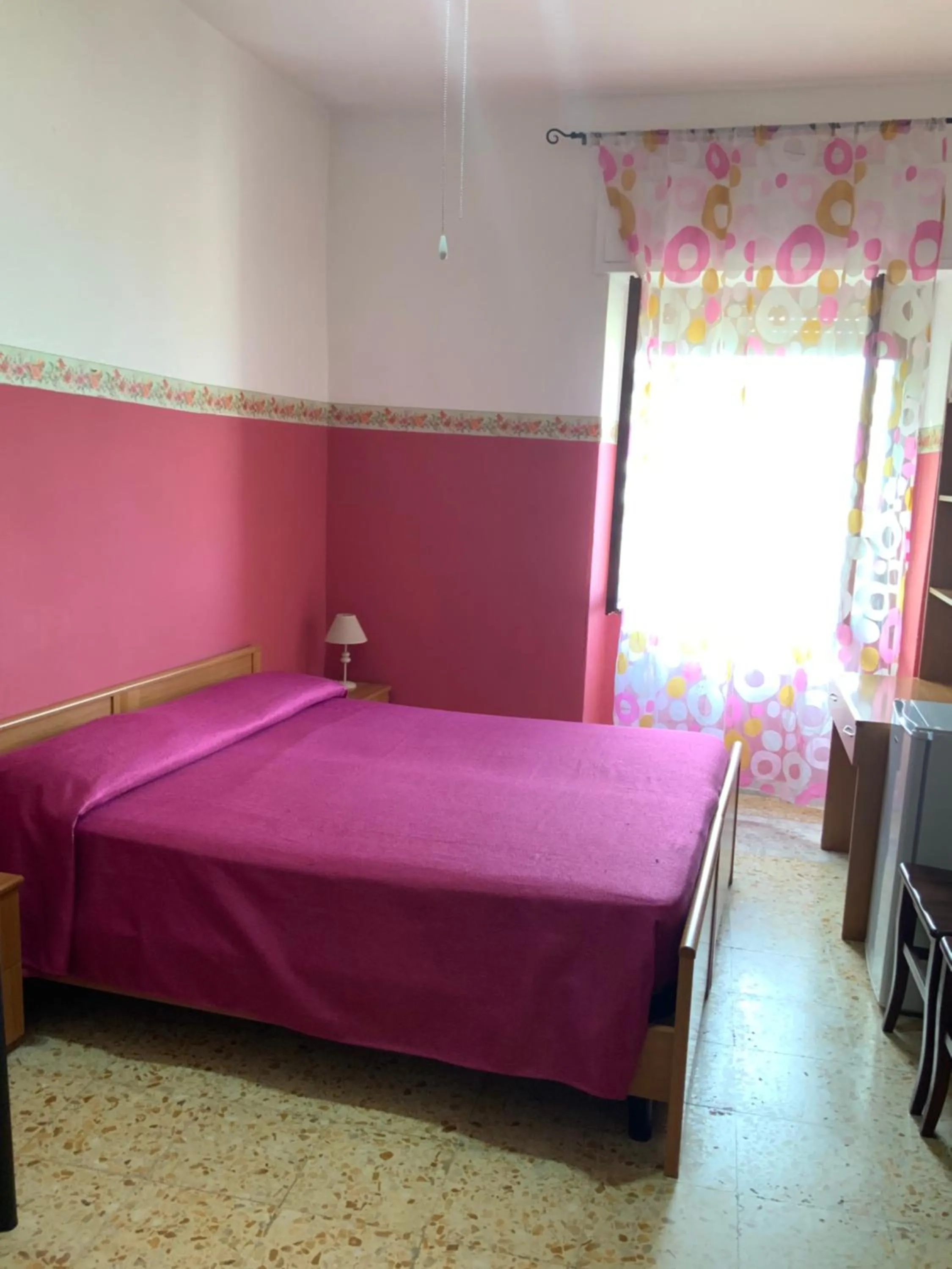 Bed in La Scogliera Bed & Breakfast