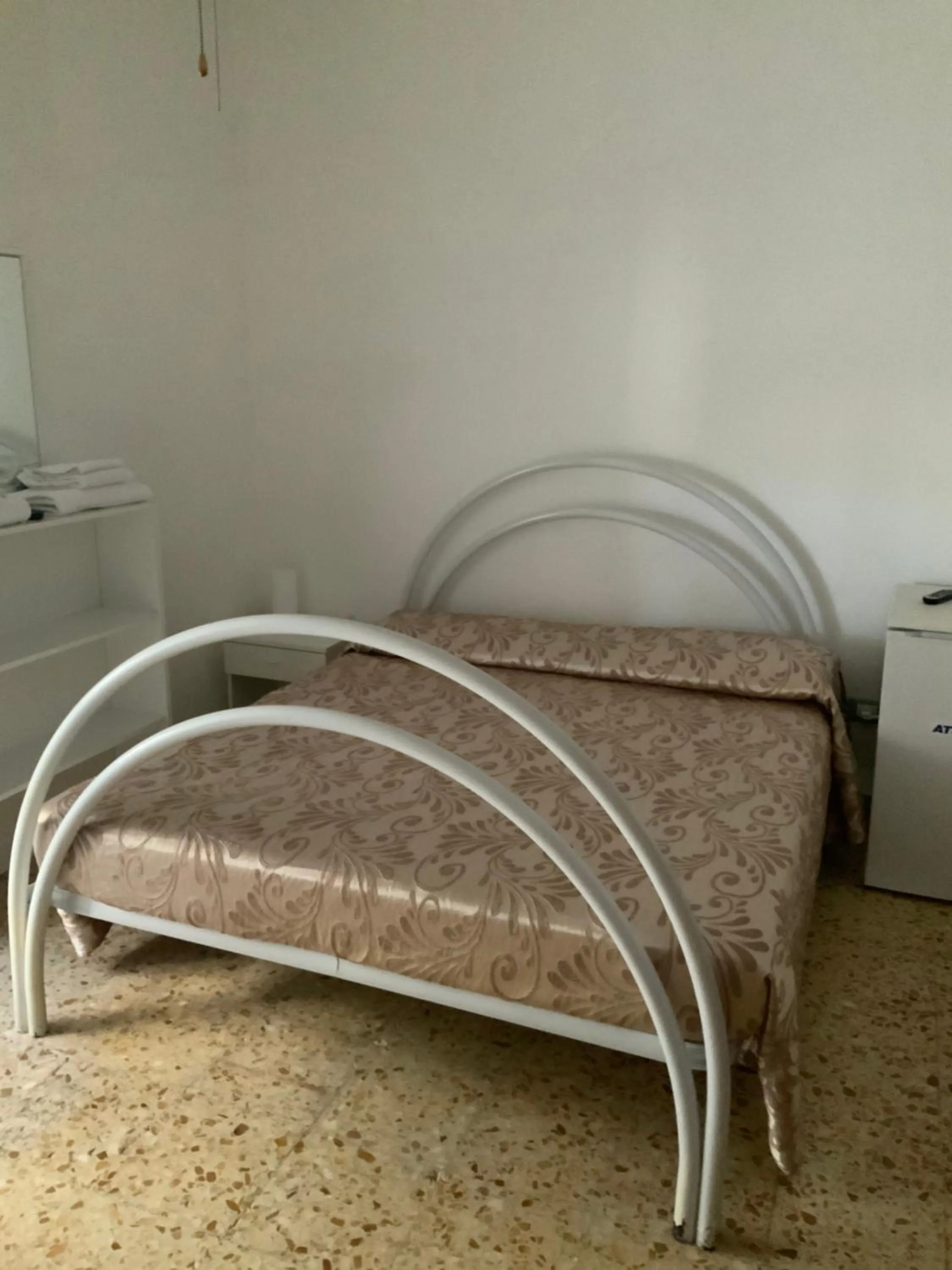 Bed in La Scogliera Bed & Breakfast