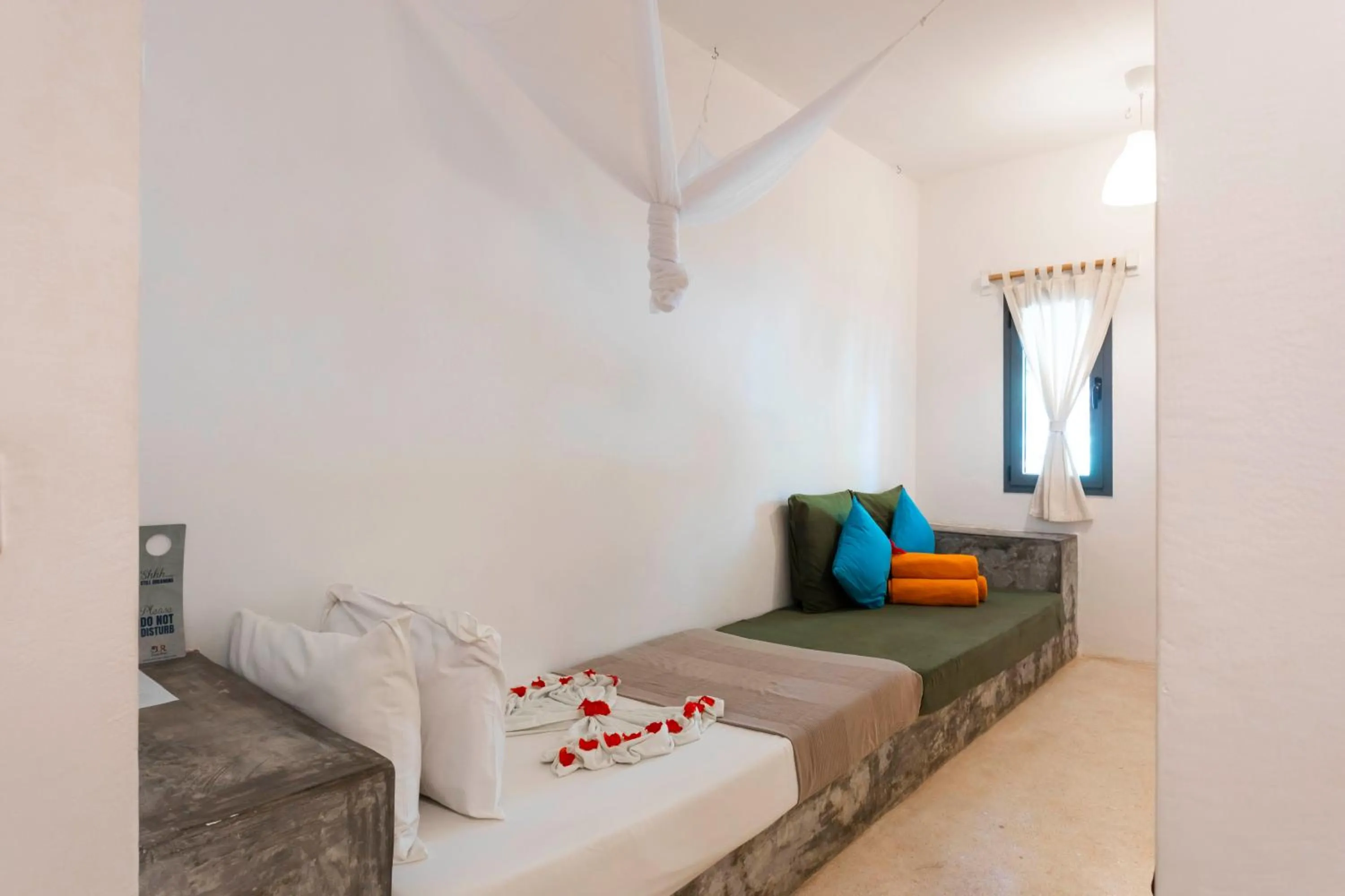 Seating area, Bed in Fun Beach Hotel