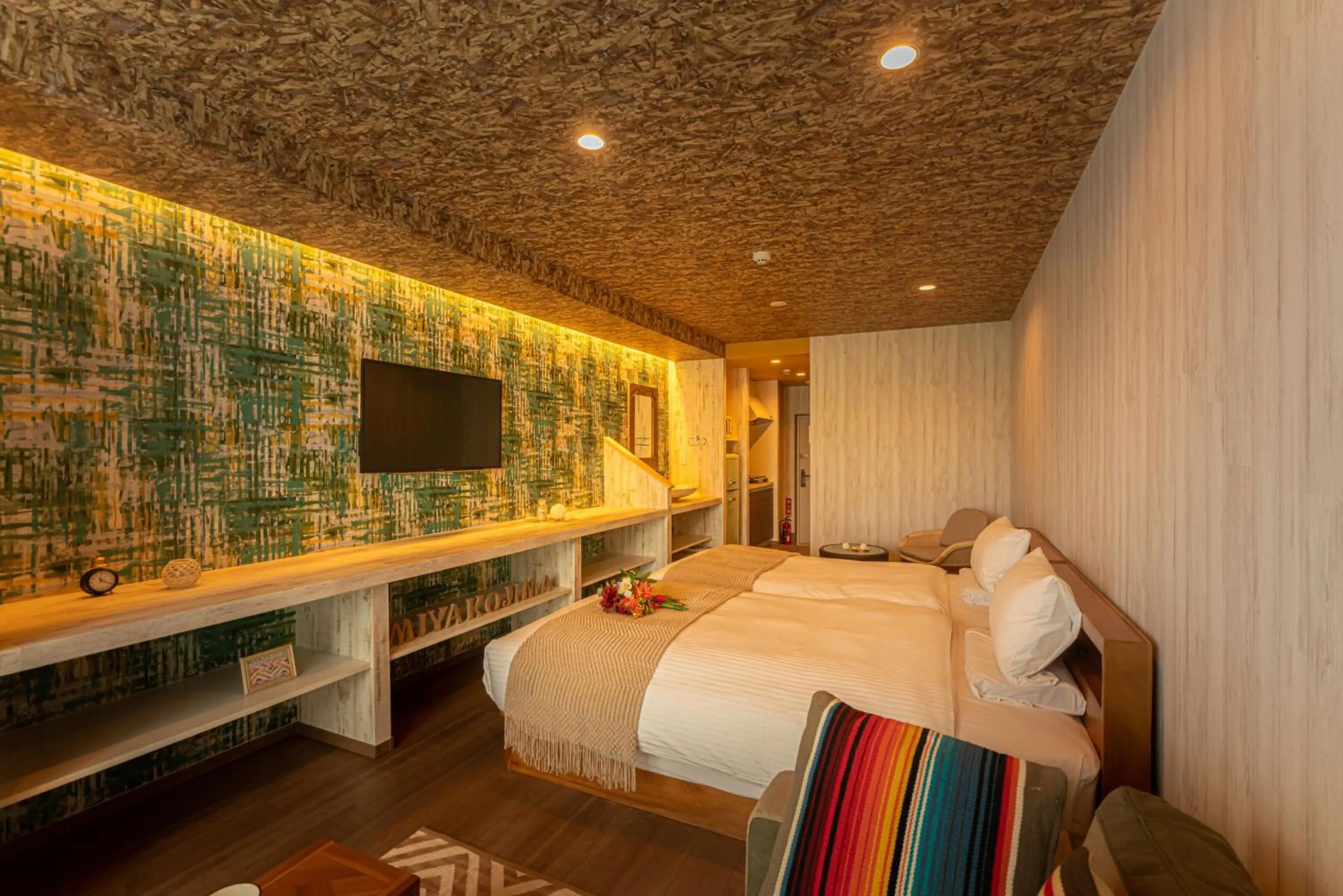 Bed in Palm Springs Miyakojima Resort