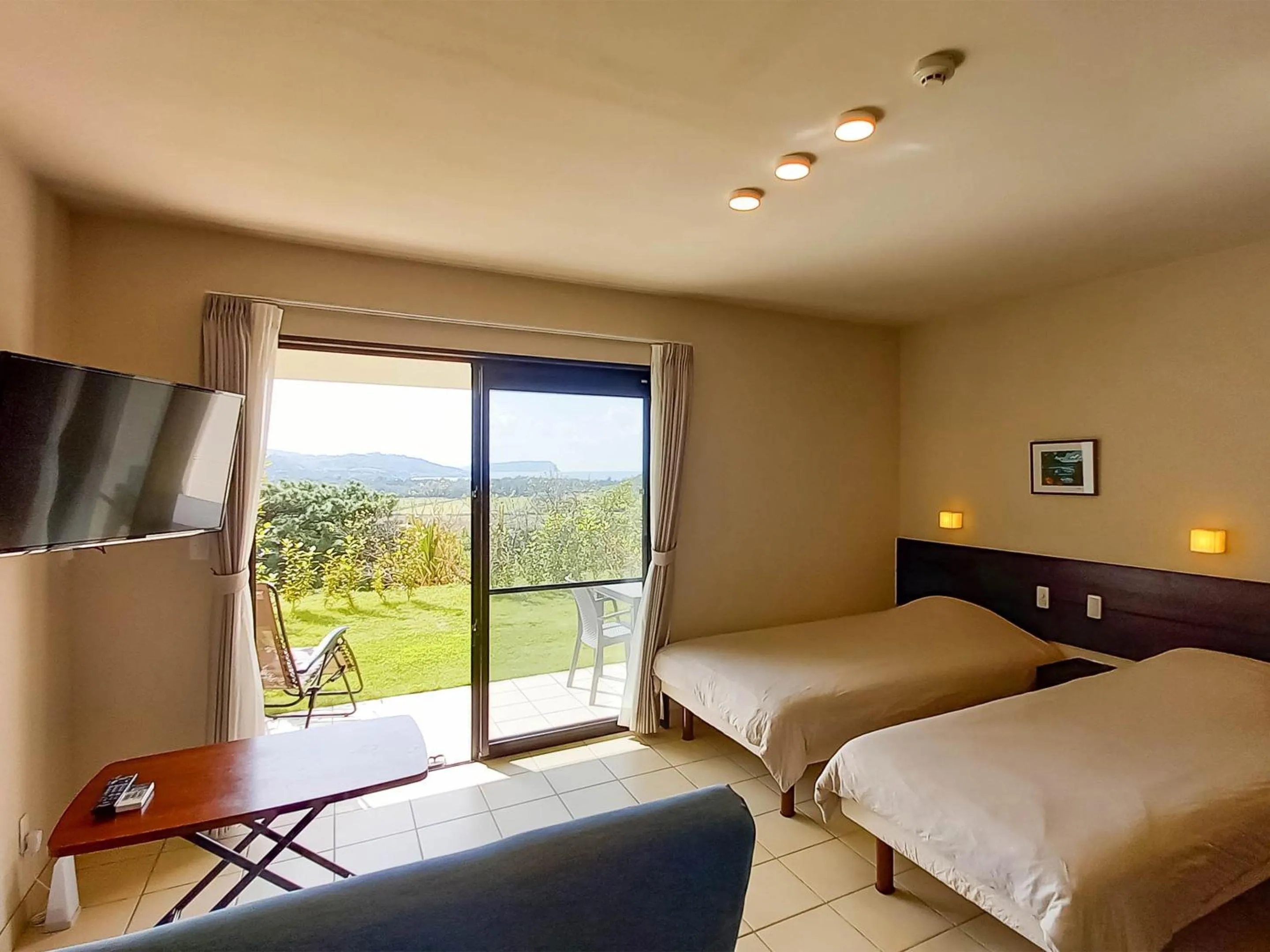 Photo of the whole room, Bed in terrace IRIOMOTEJIMA CONDOMINIUM