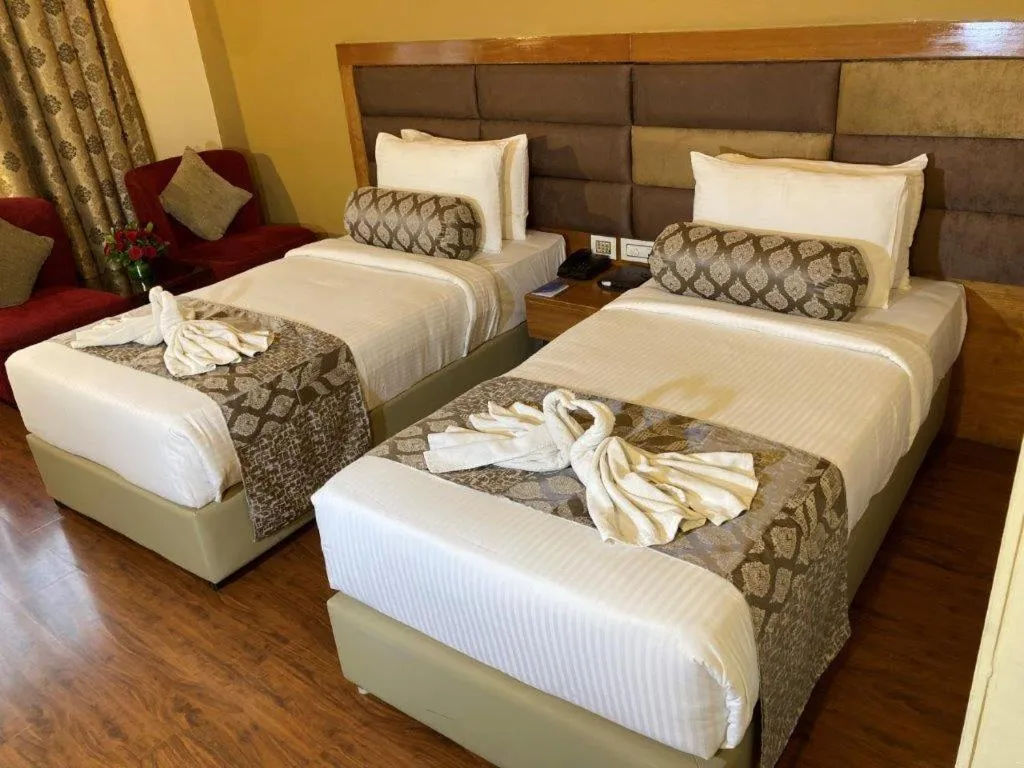 Bedroom, Bed in Hotel Ramanashree Richmond