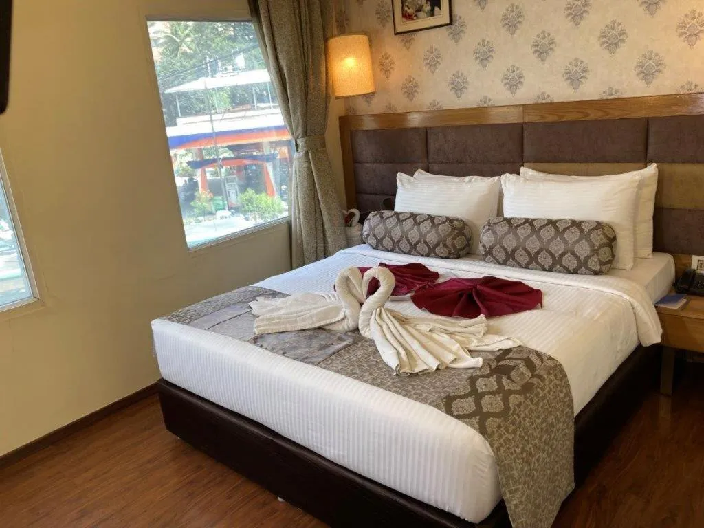 Bedroom, Bed in Hotel Ramanashree Richmond