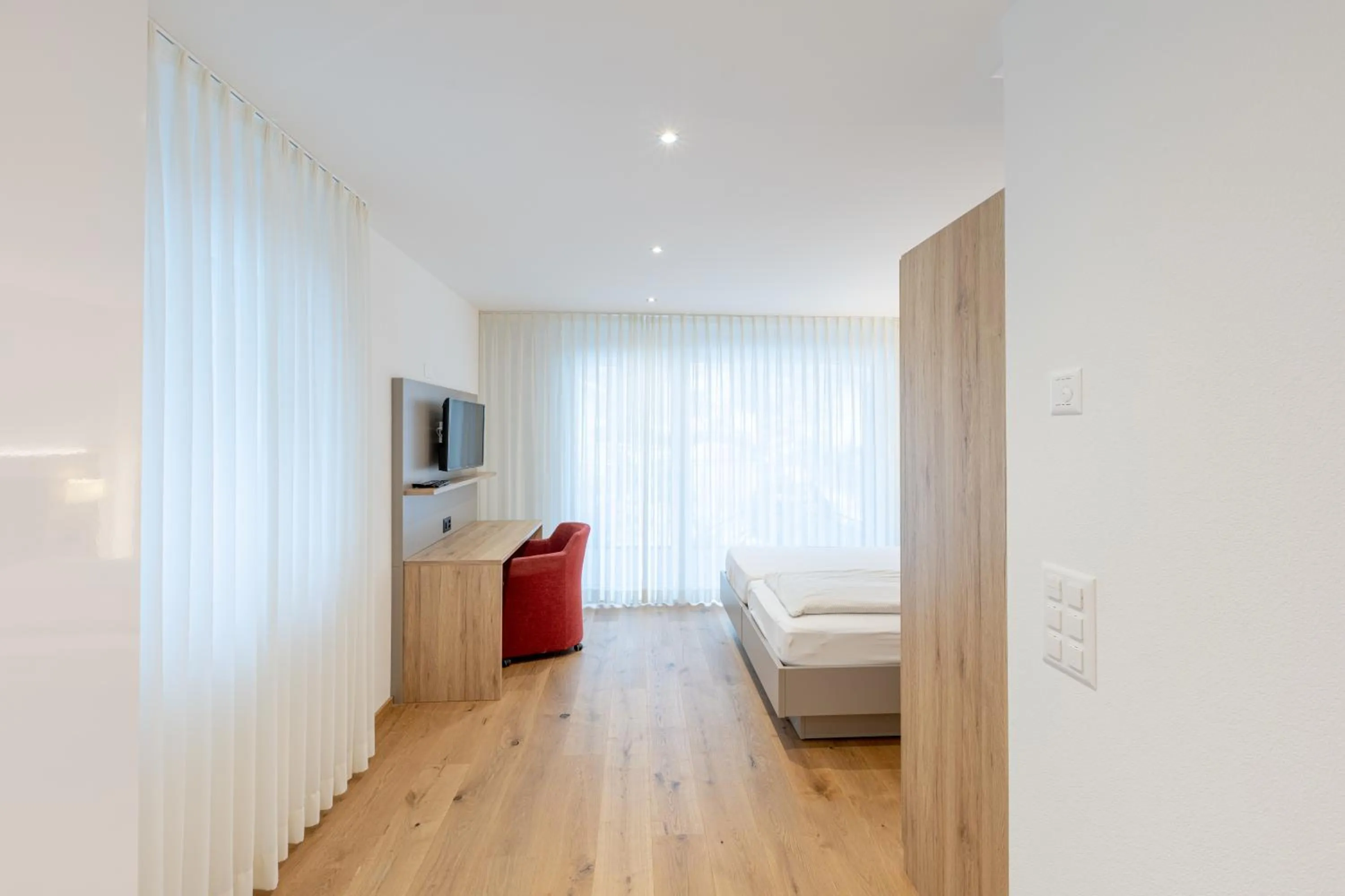 Bed in Hotel Flamatt