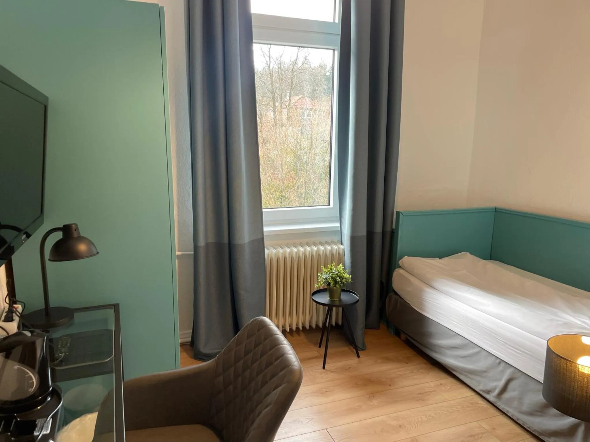 Photo of the whole room, Bed in Berghotel HARZ