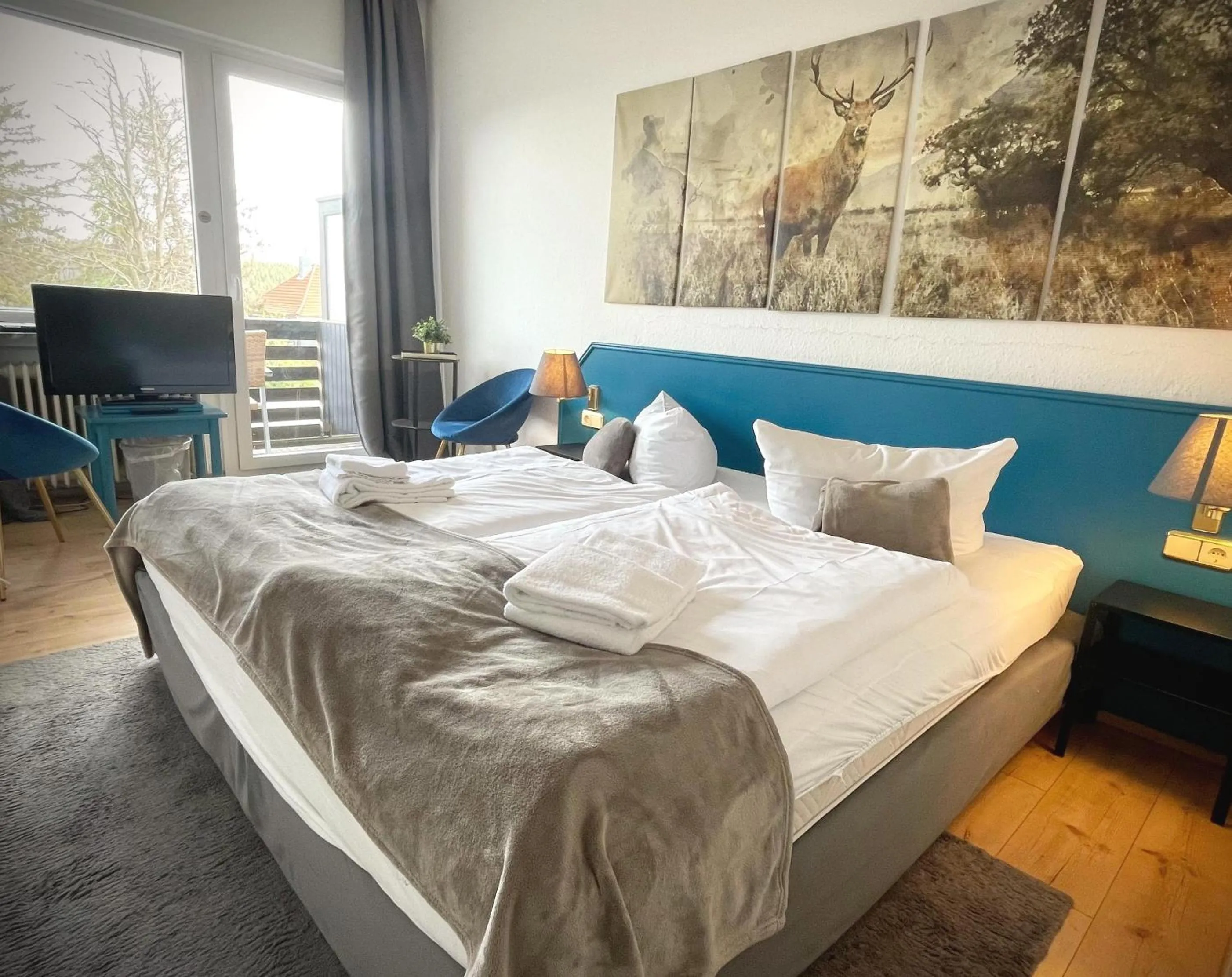 Photo of the whole room, Bed in Berghotel HARZ