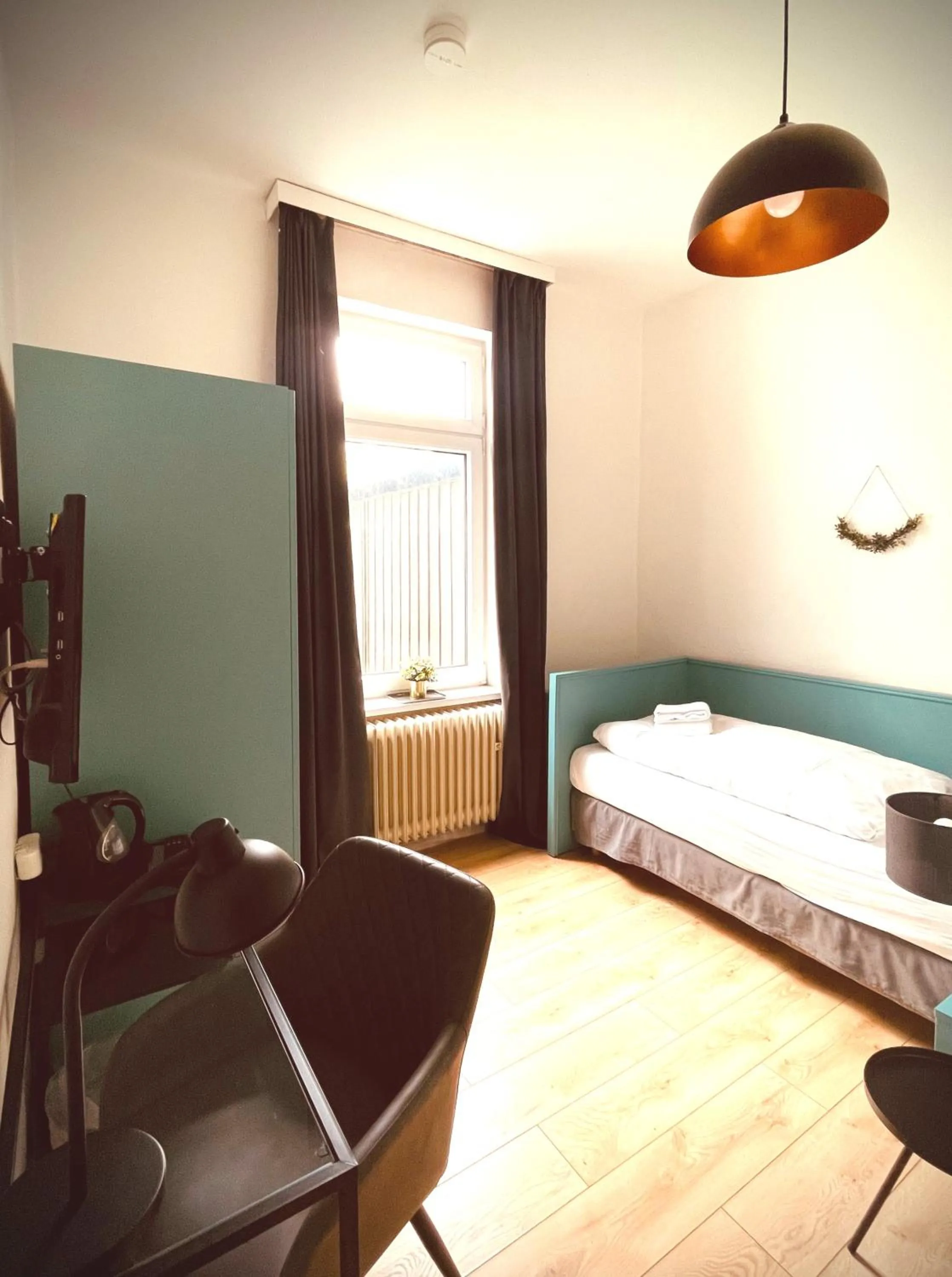 Photo of the whole room, Bed in Berghotel HARZ