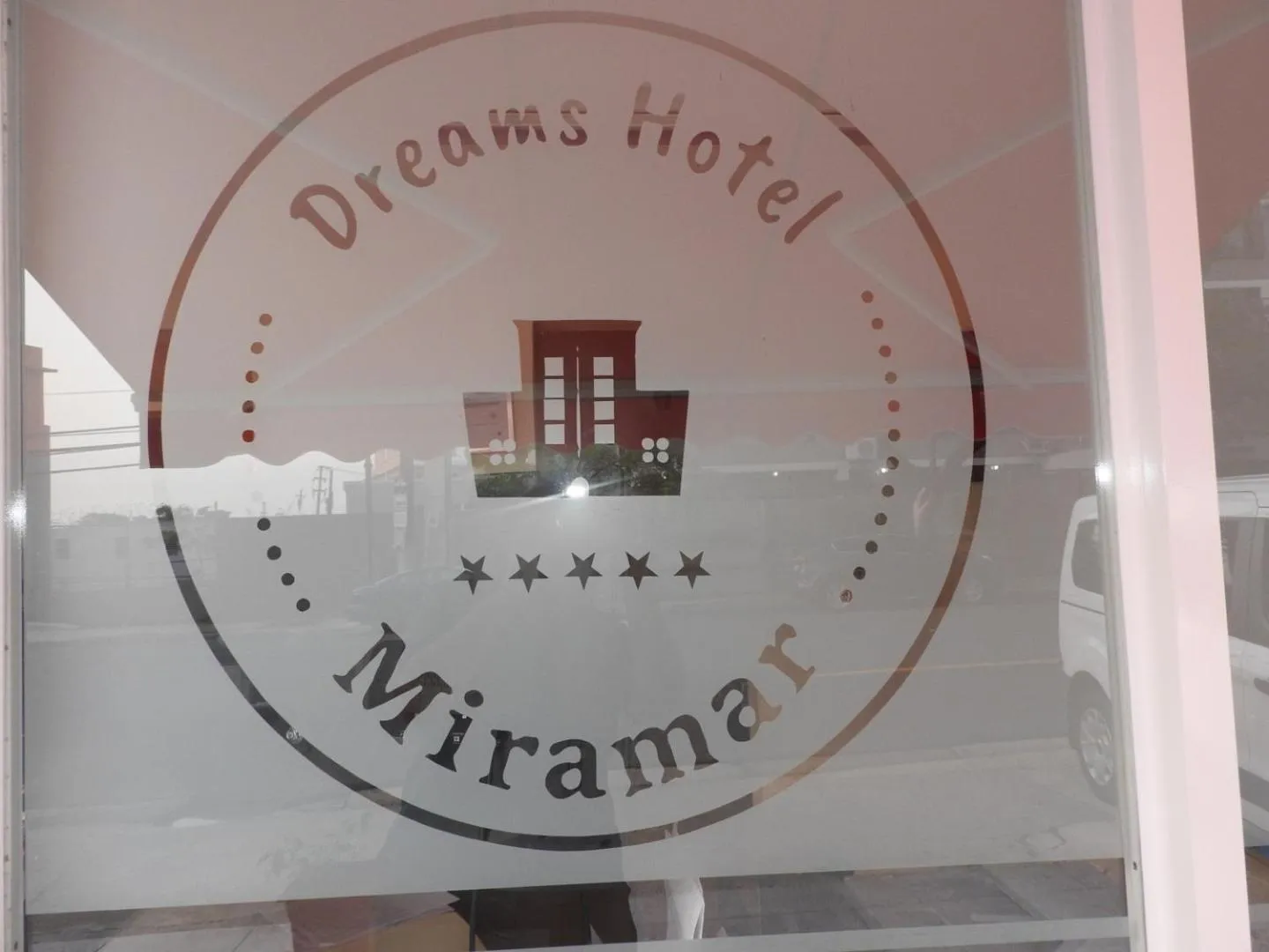 Property logo or sign in Dreams Miramar