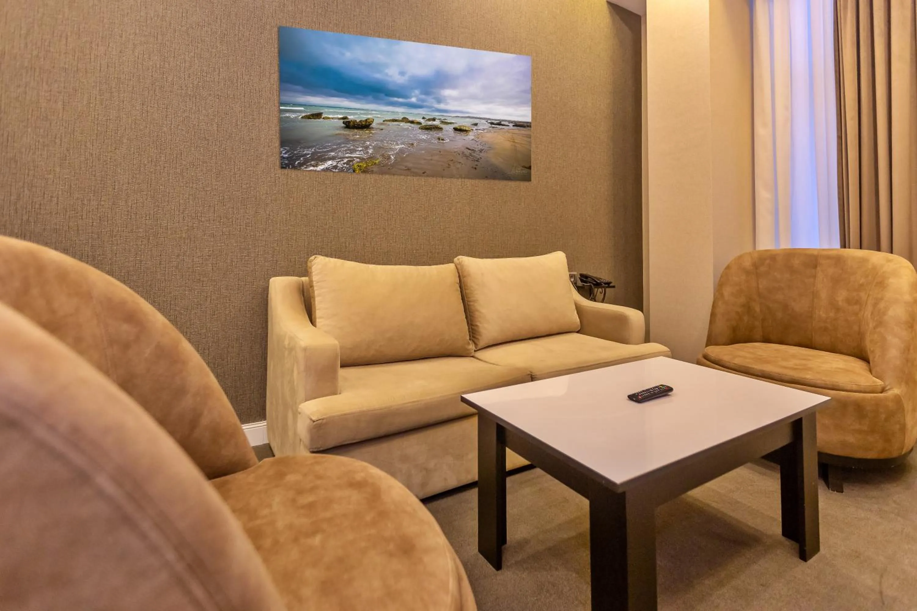 Living room in Aksent Hotel