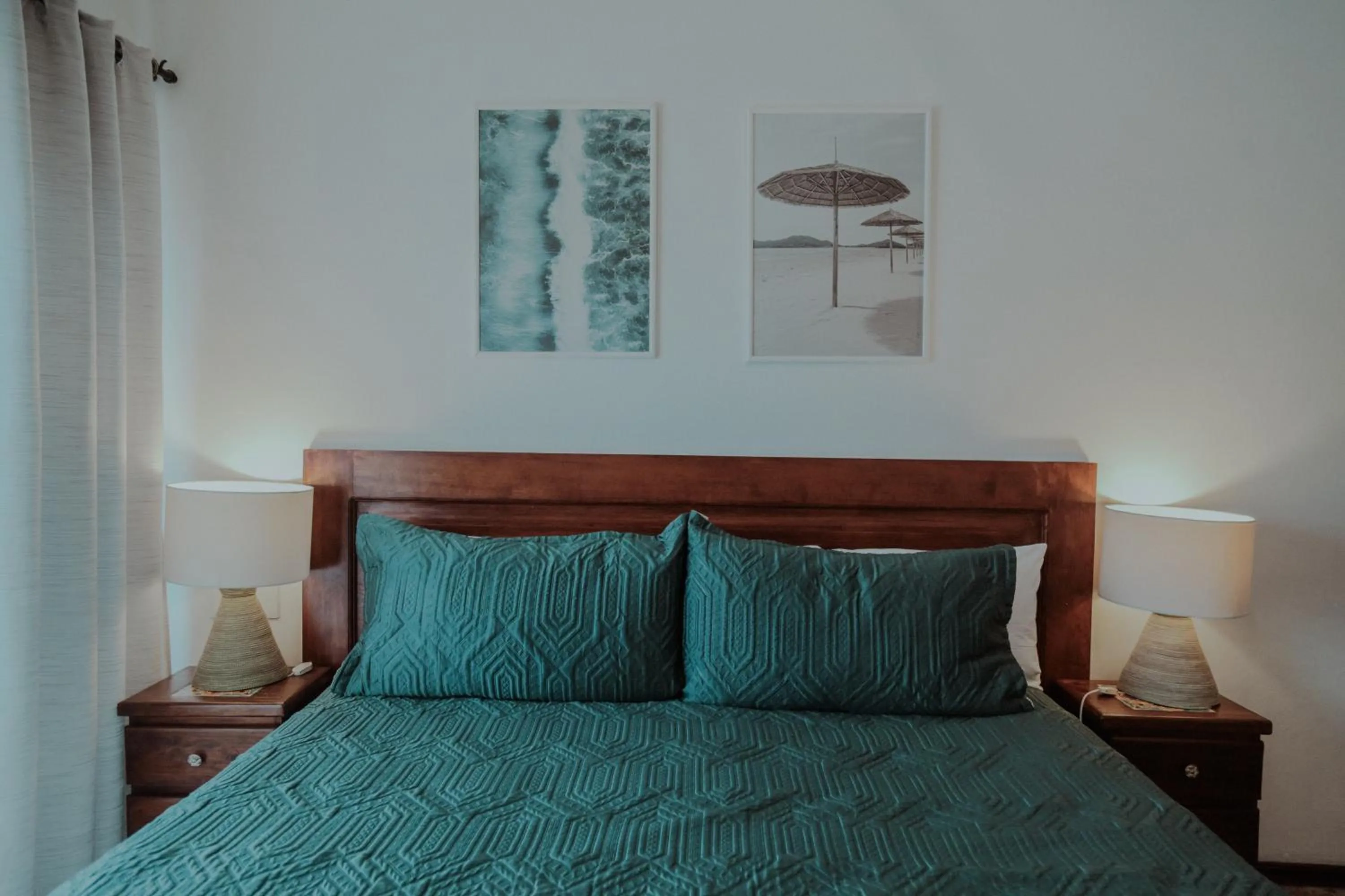 Bed in Fabiola Condo Hotel