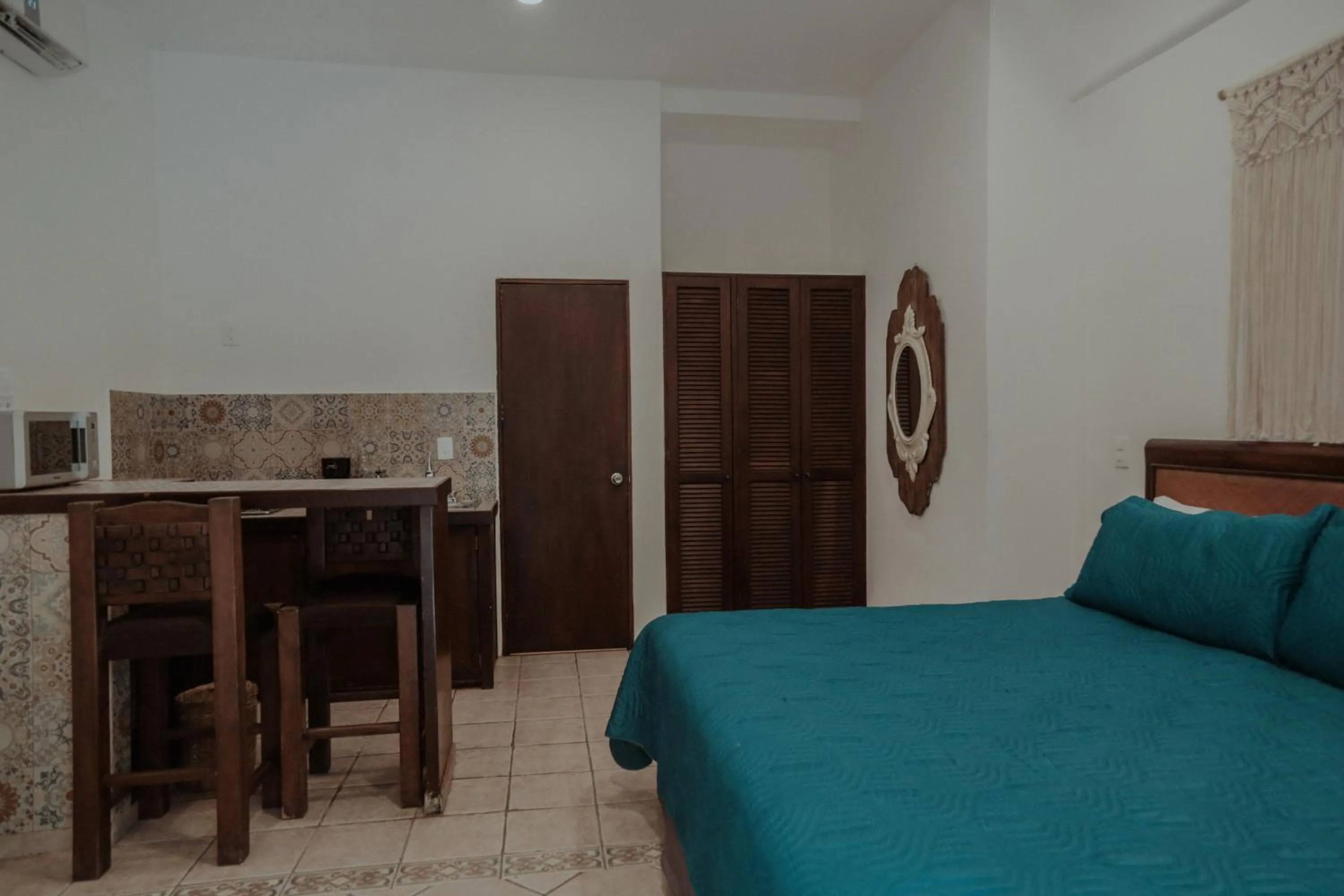 Bed in Fabiola Condo Hotel