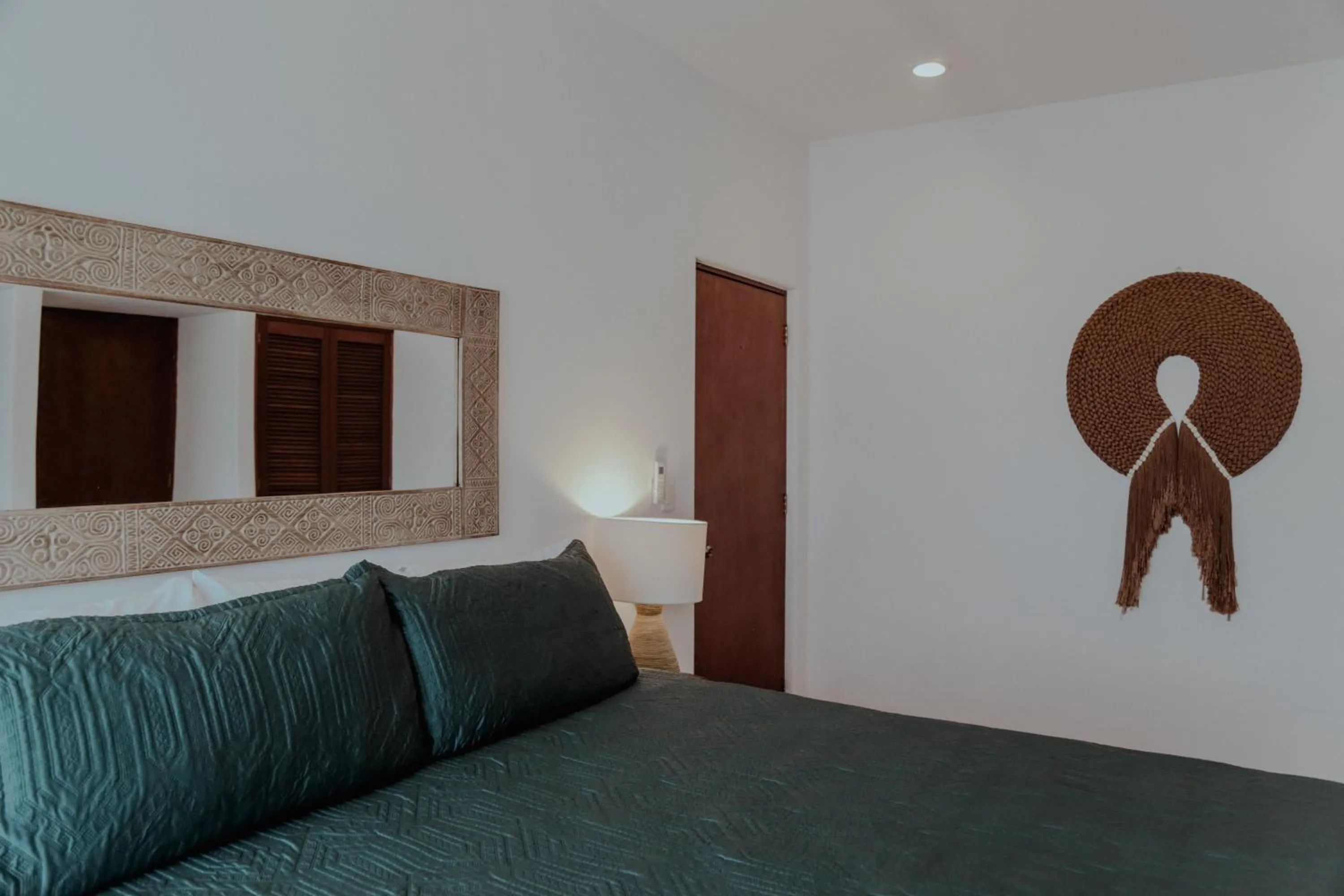 Bed in Fabiola Condo Hotel