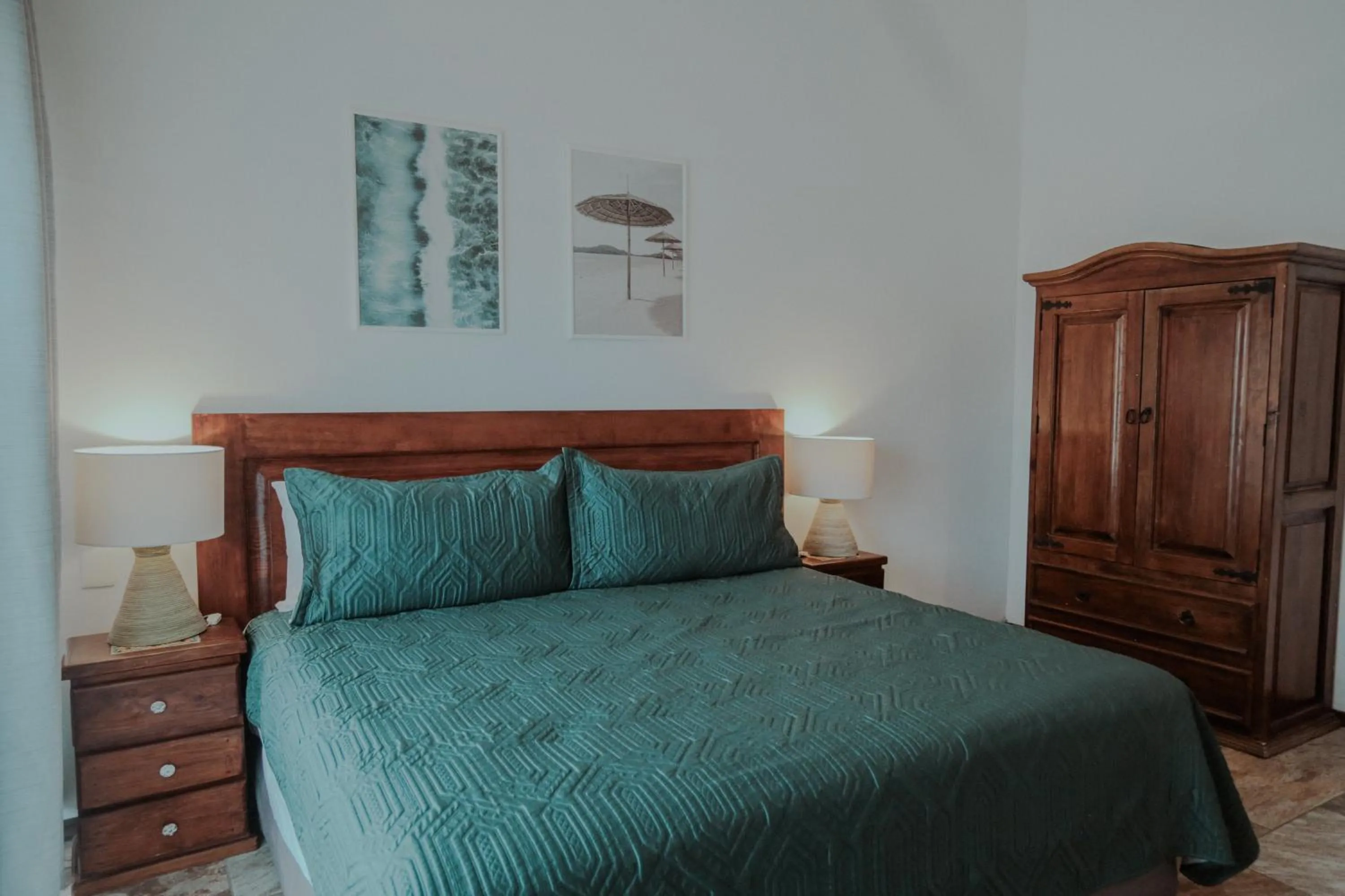 Bed in Fabiola Condo Hotel