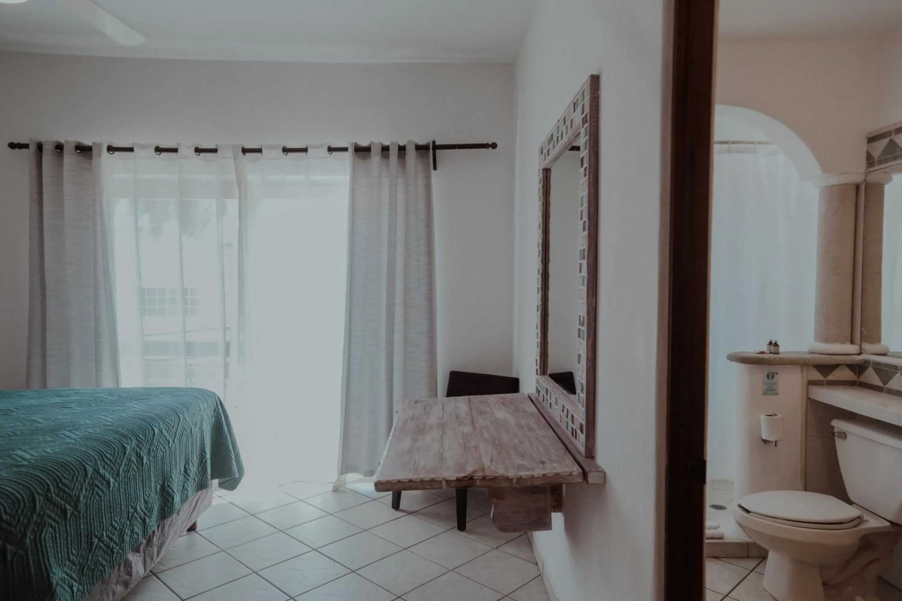 Bed in Fabiola Condo Hotel