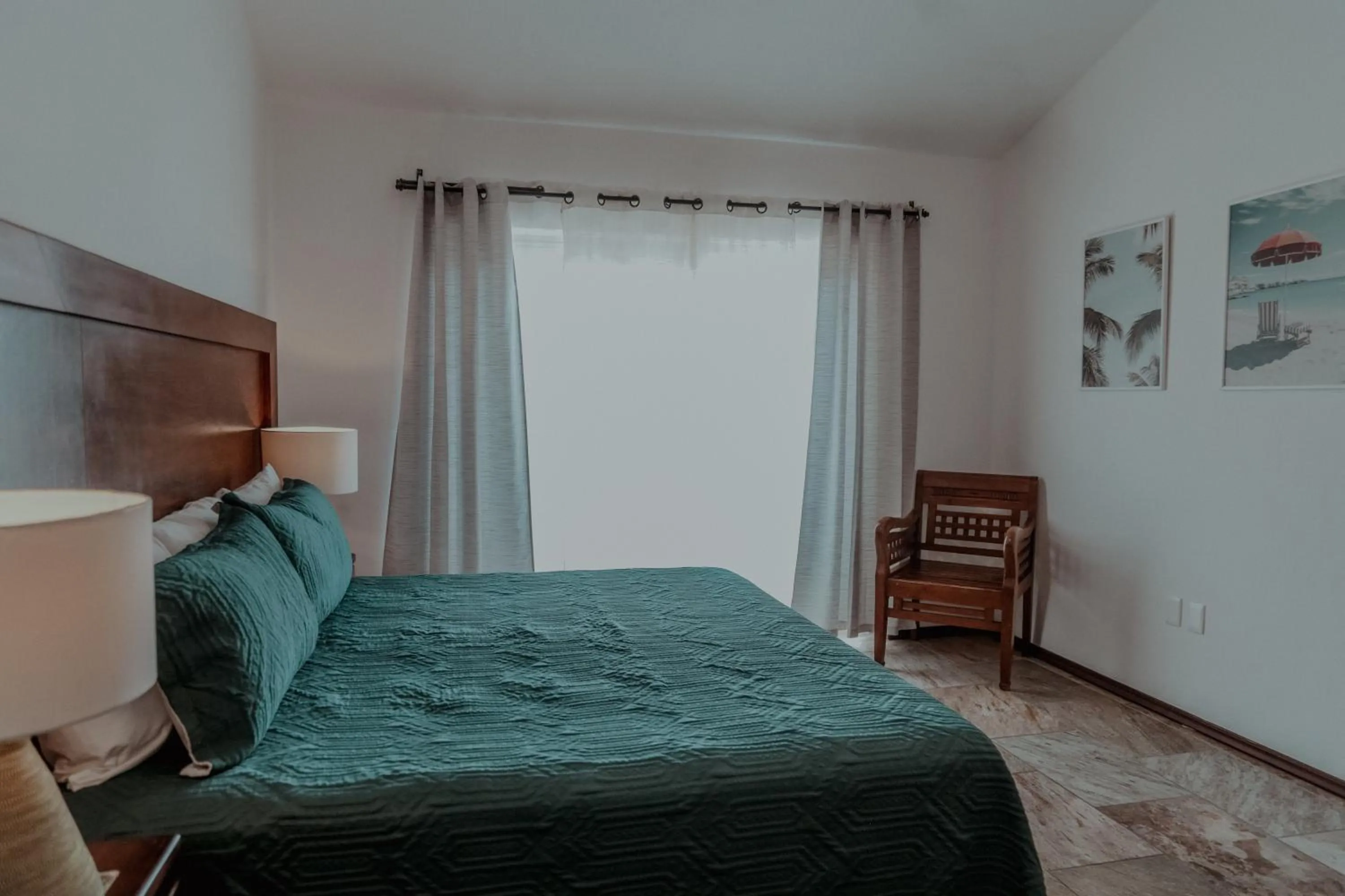 Bed in Fabiola Condo Hotel