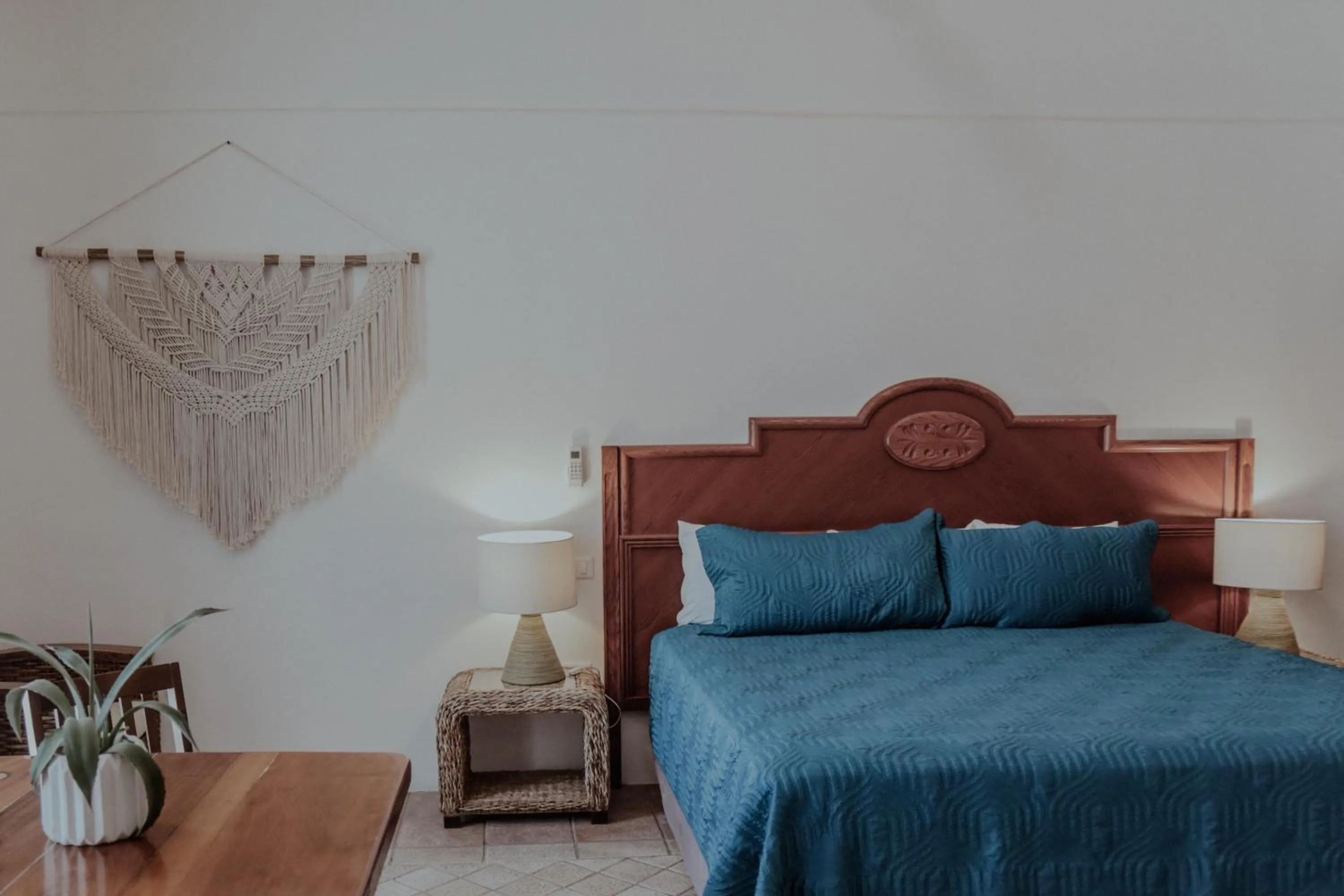 Bed in Fabiola Condo Hotel