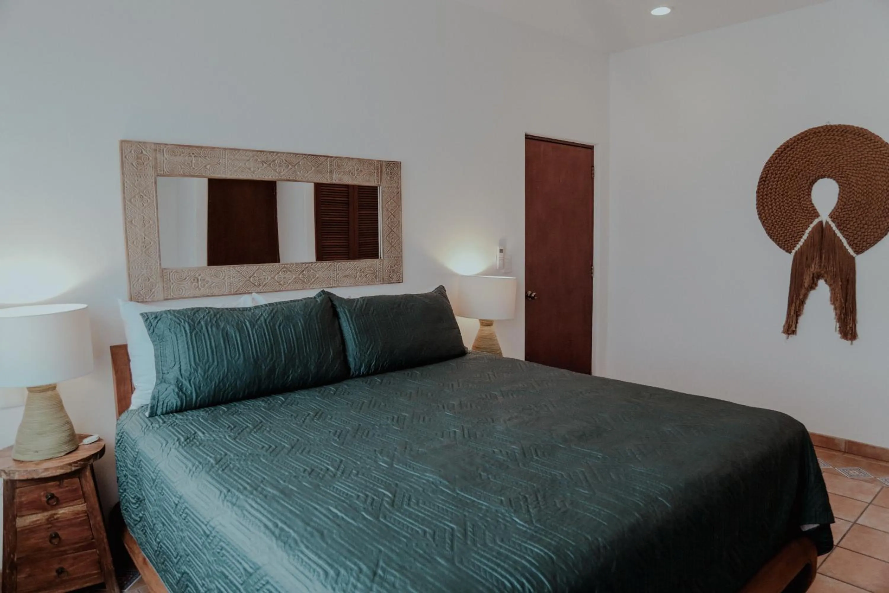 Bed in Fabiola Condo Hotel