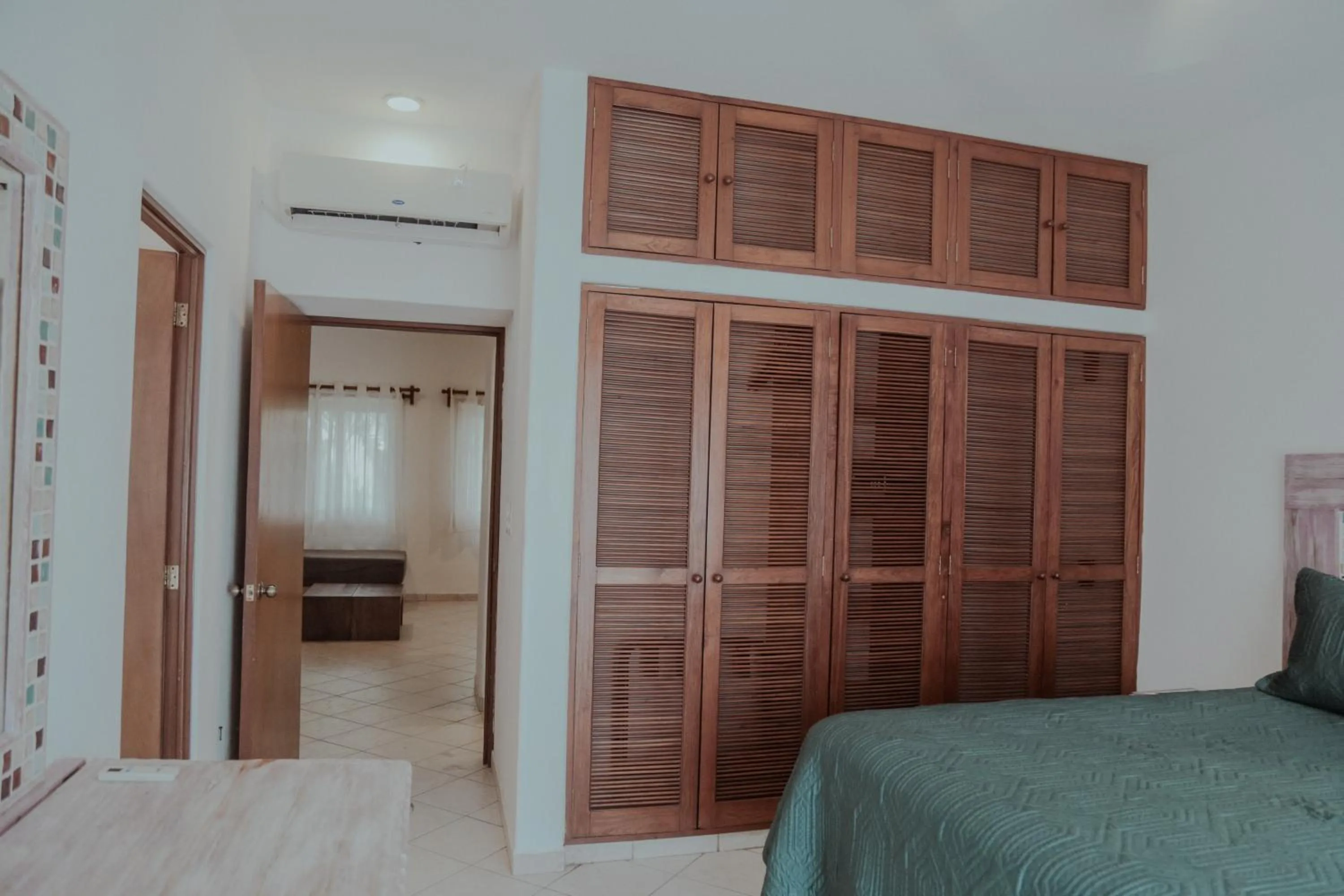 Bed in Fabiola Condo Hotel