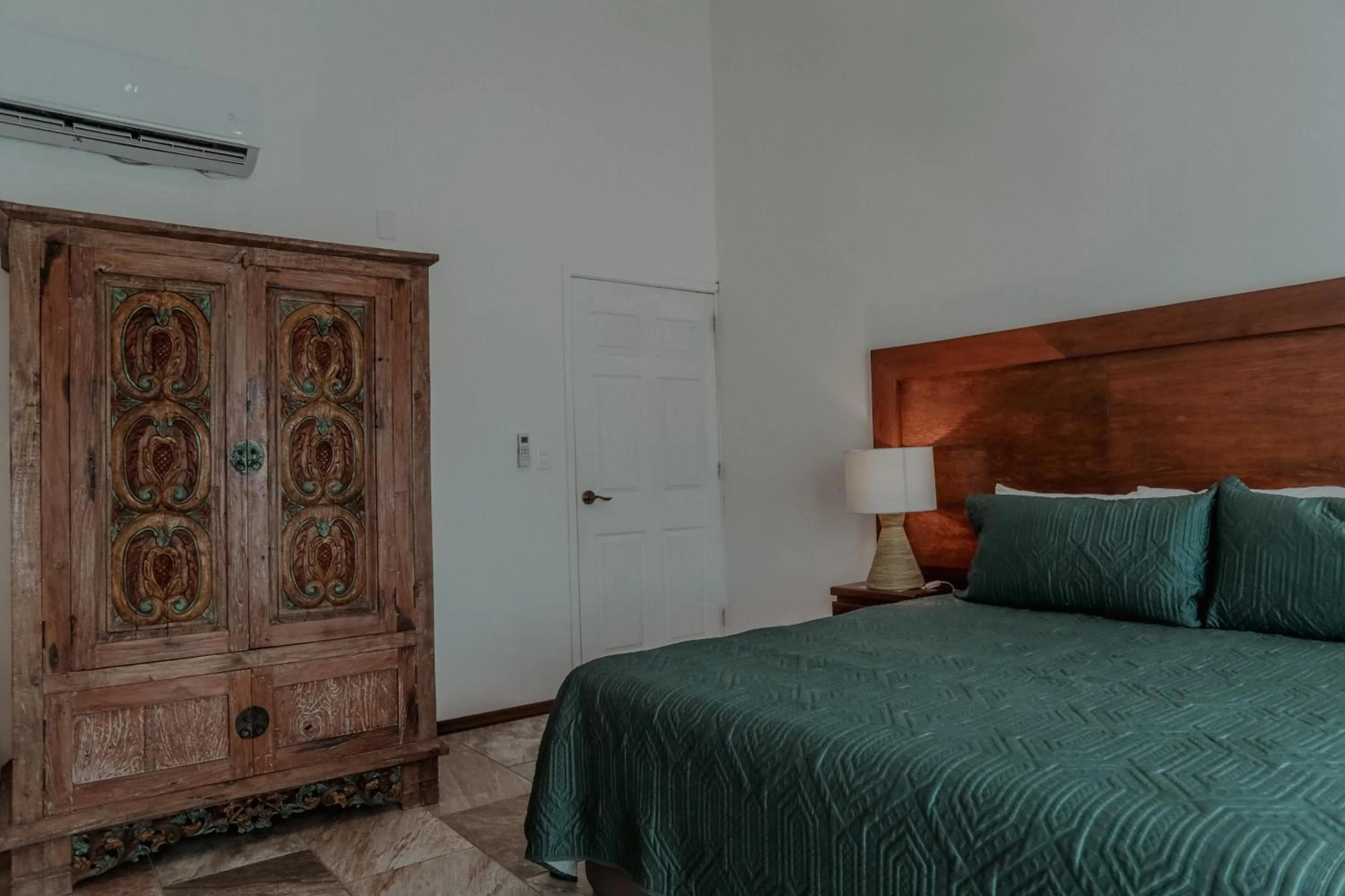 Bed in Fabiola Condo Hotel