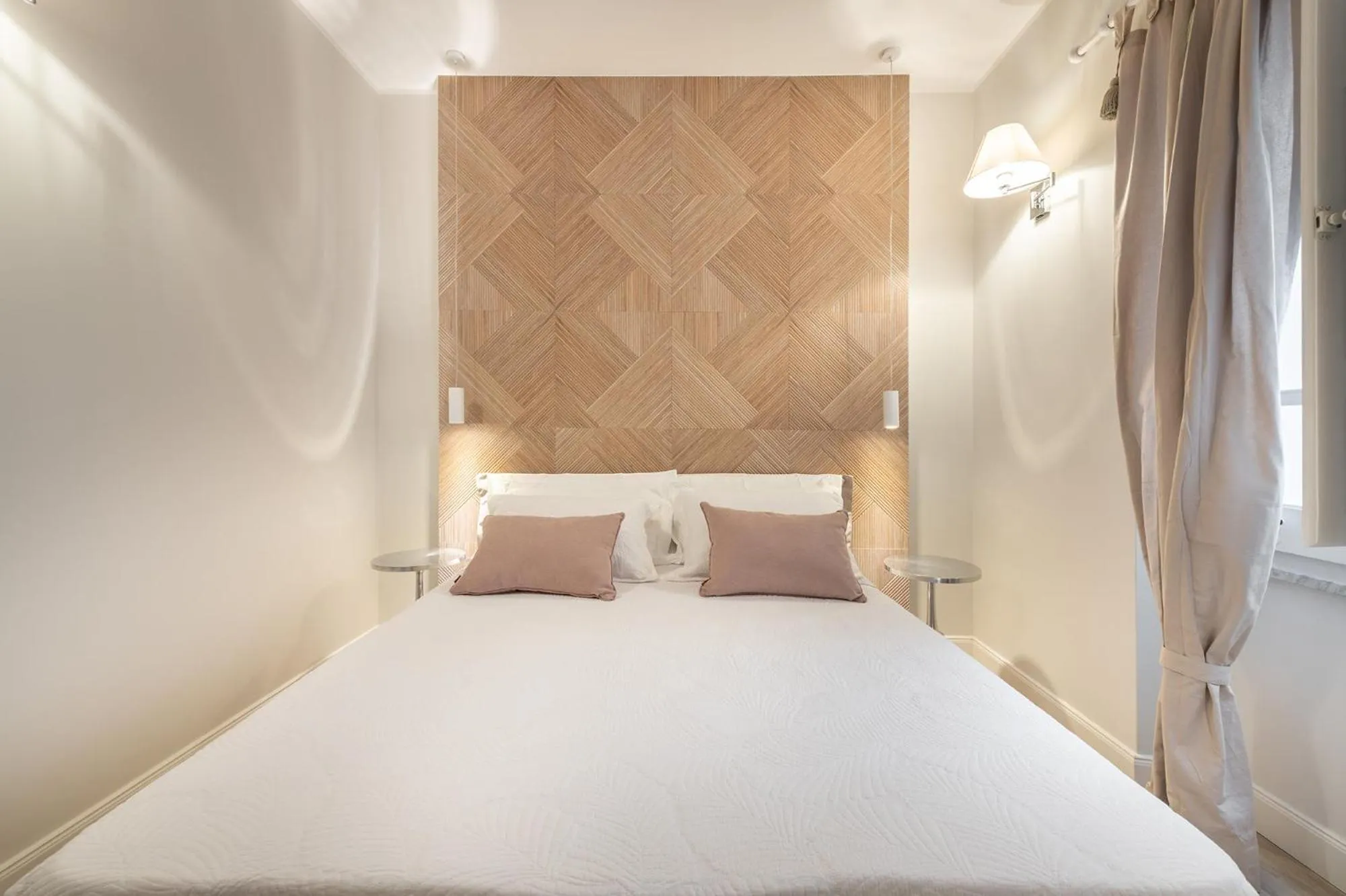 Bed in AQUAMADRE Suites