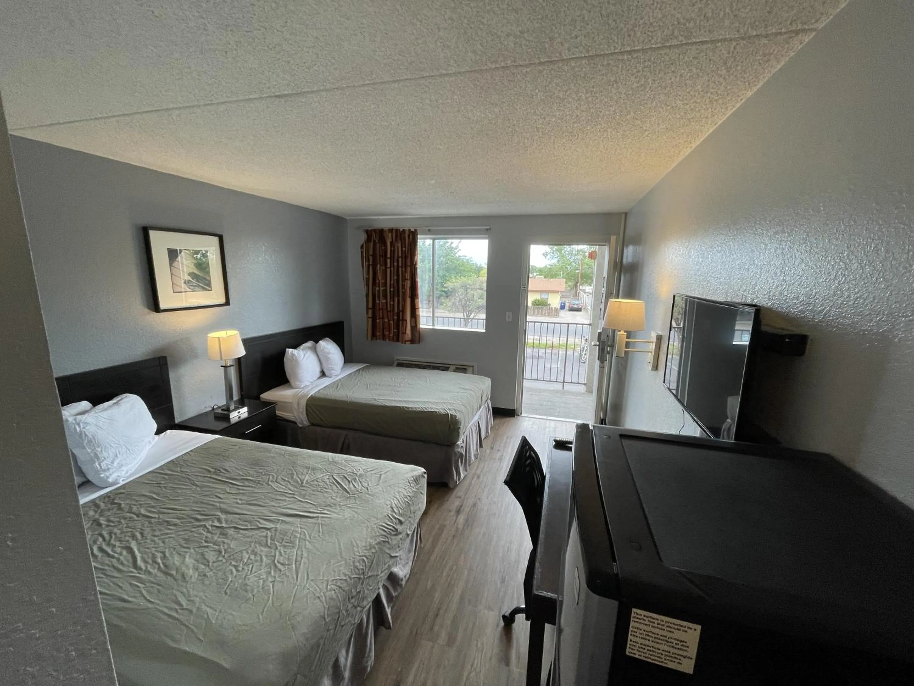 View (from property/room), Bed in Rodeway Inn Albuquerque West