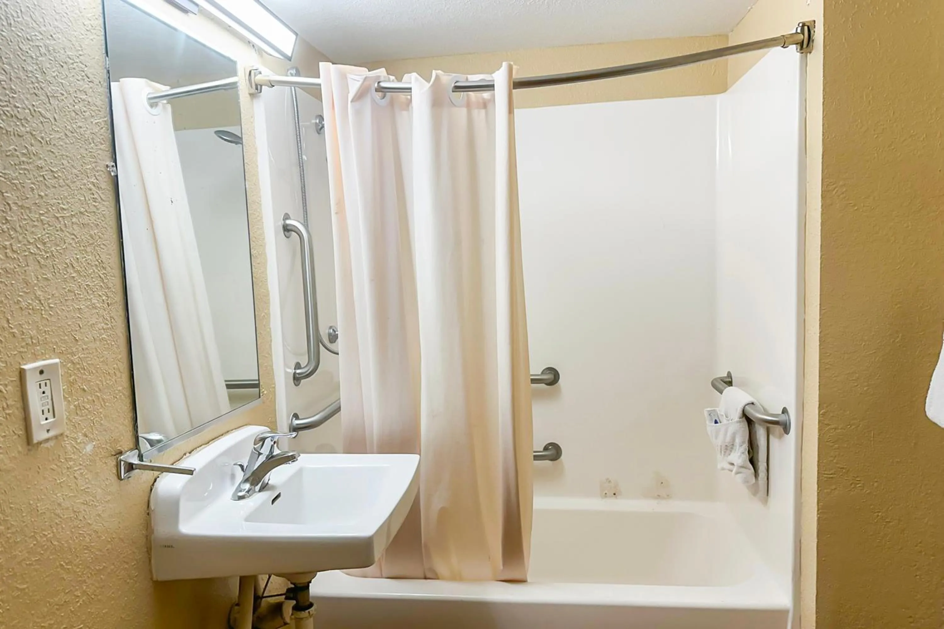 Bathroom in OYO Hotel Mobile, AL I-65 at Airport Blvd